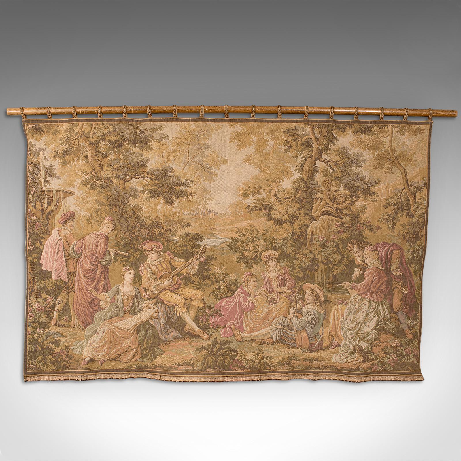 This is a large antique decorative tapestry. A French, needlepoint wall panel with Continental taste, dating to the late Victorian period, circa 1900.

Classically appealing tapestry scene with companion hanging rail
Displays a desirable aged