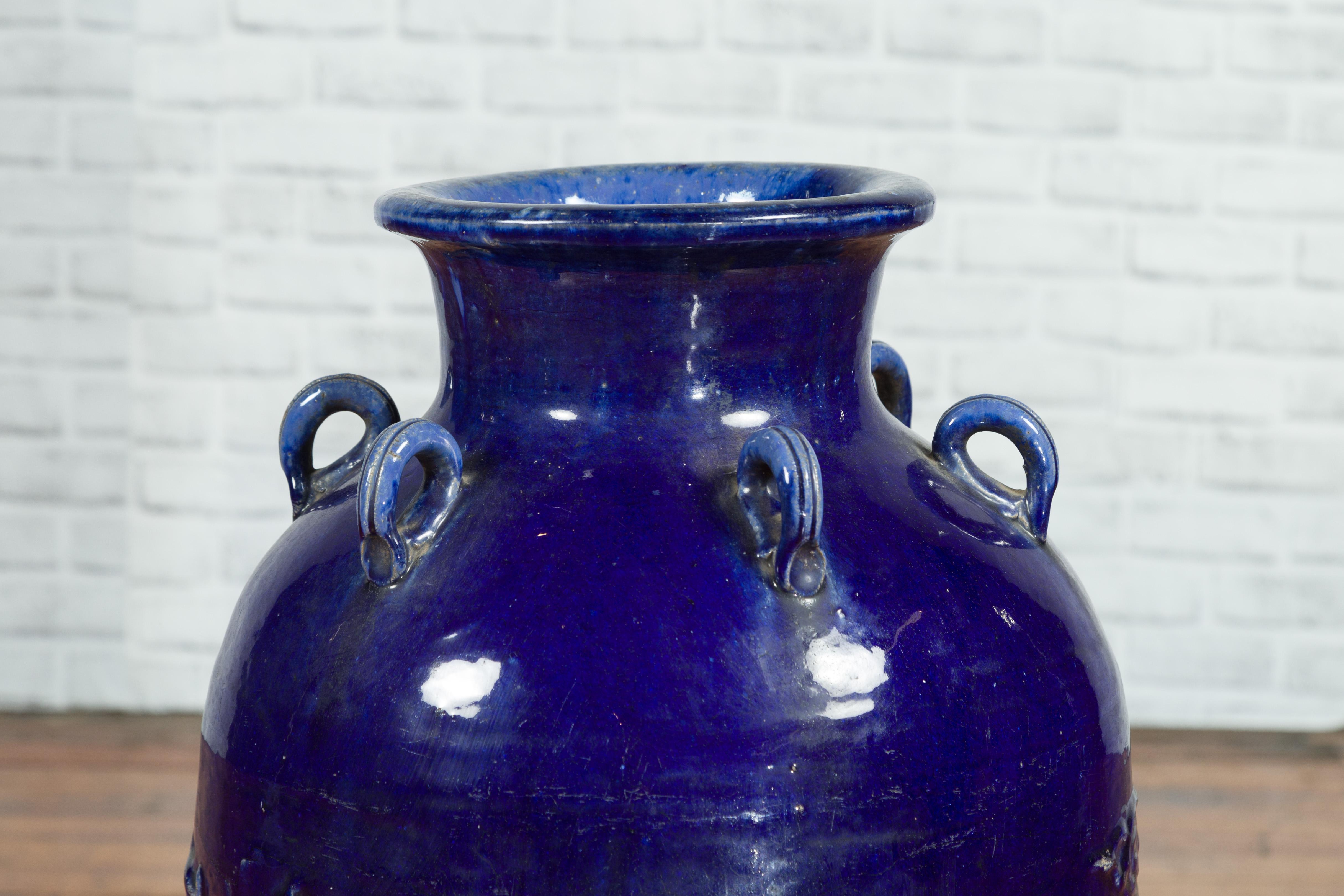 Glazed Large Antique Early 20th Century Vietnamese Blue Martaban Jar with Raised Motifs For Sale