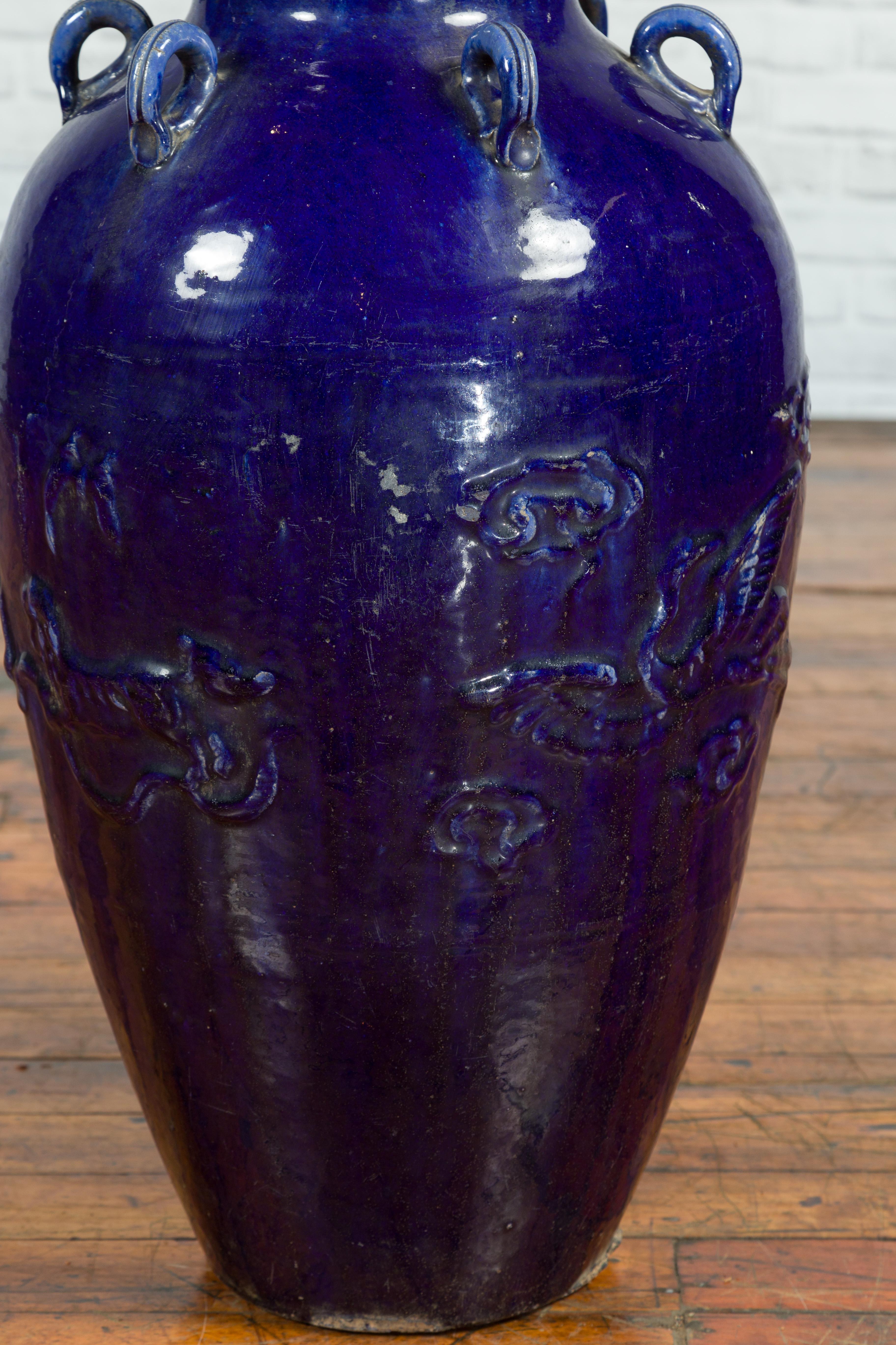 Large Antique Early 20th Century Vietnamese Blue Martaban Jar with Raised Motifs In Good Condition For Sale In Yonkers, NY