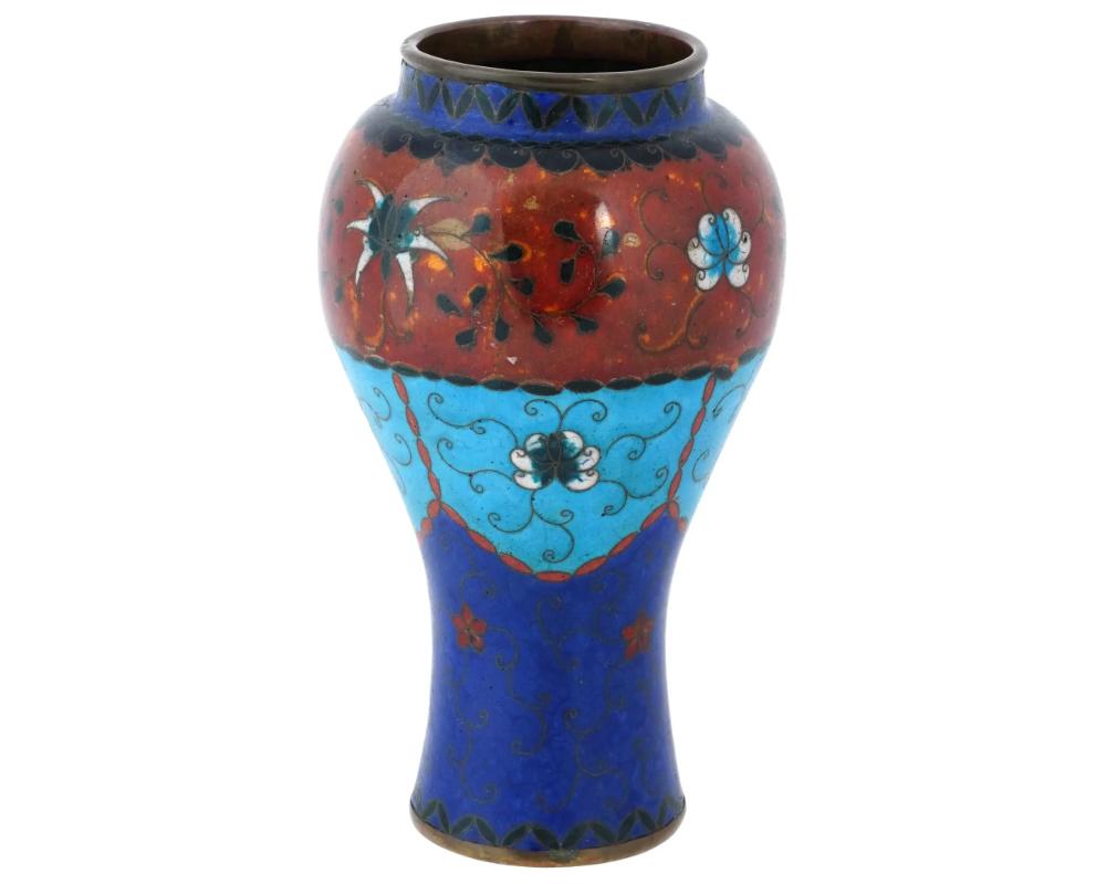 A large antique Japanese early Meiji period vase attributed to Namikawa Yasuyuki, a prominent cloisonne artist of the time. Showcases the highly regarded craftsmanship and intricate technique of cloisonne enamel associated with Japanese artistry