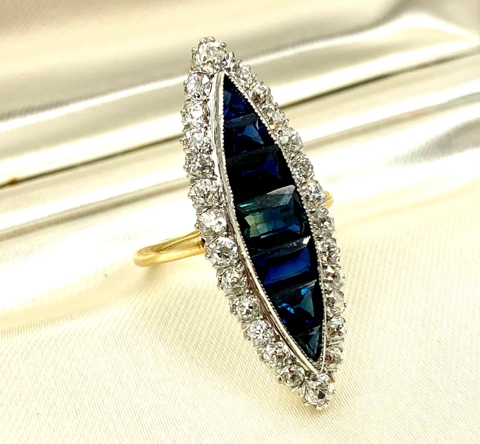 Women's or Men's Large Antique Edwardian Diamond, Invisibly Set Sapphire 18k Gold Navette Ring For Sale