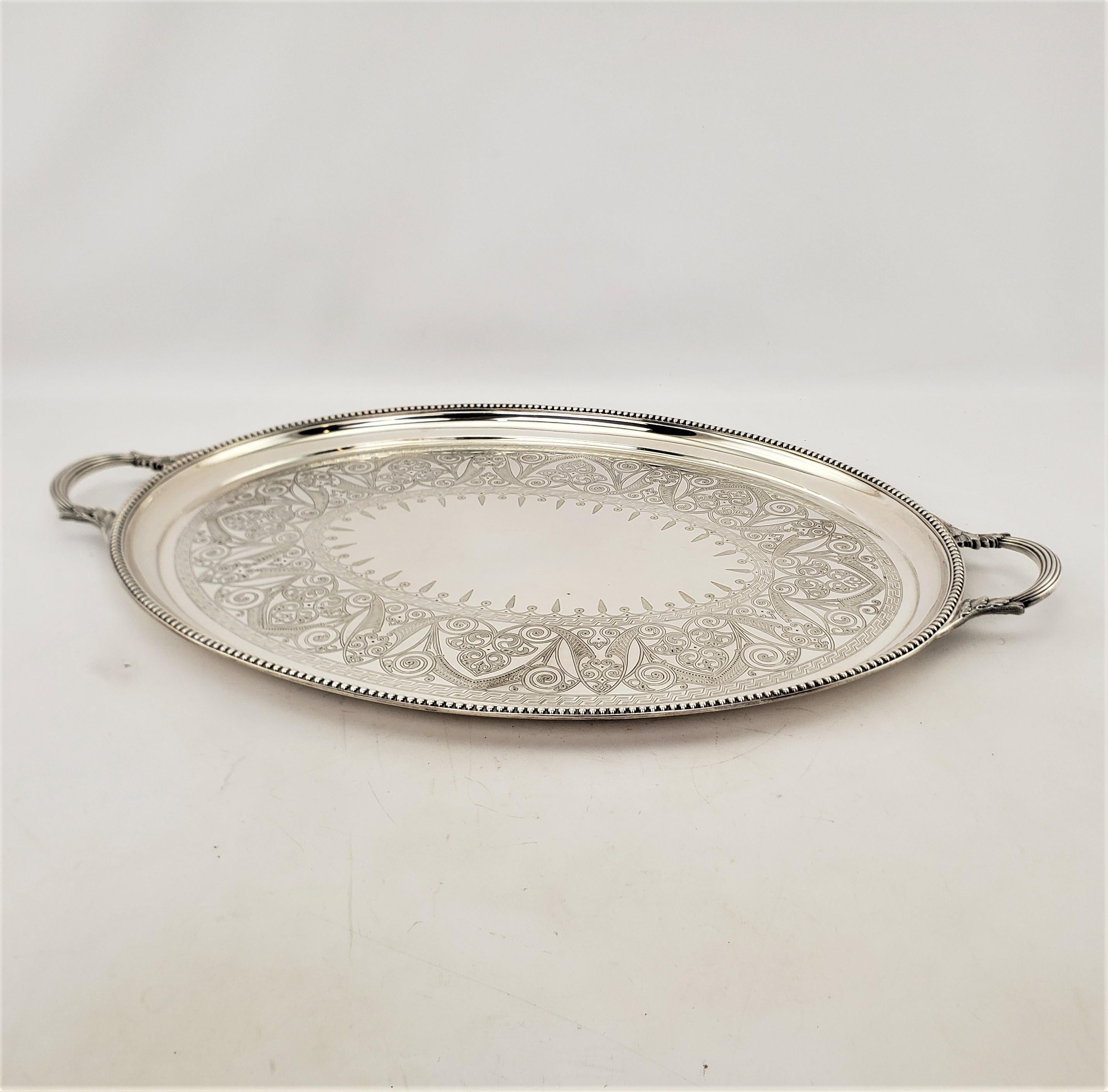 Machine-Made Large Antique Elkington Oval Silver Plated Serving Tray with Floral Engraving For Sale