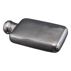 Large antique engine-turned silver hip flask