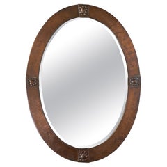 Grand miroir ovale anglais ancien Arts & Crafts en cuivre Liberty & Co.