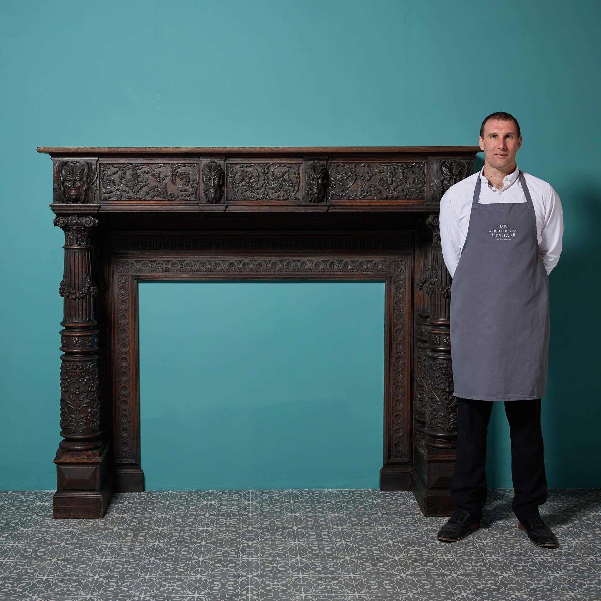 A very large antique English carved oak Victorian fire mantel reclaimed from a property in Staffordshire.
 
Dating to circa 1870, this stunning antique fireplace is ideal for a large main room in a property, crafted entirely from good quality