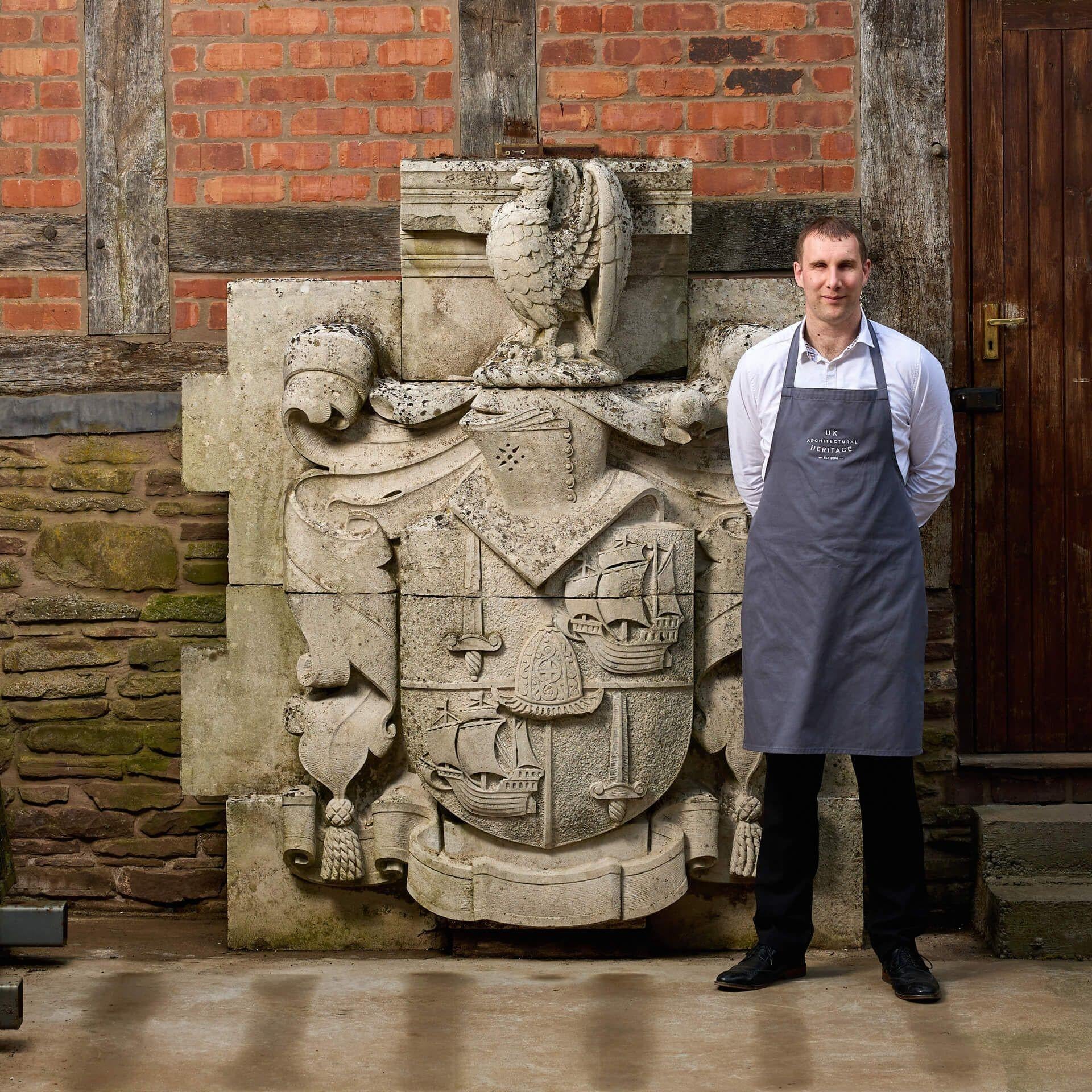 A very large antique English carved Portland stone armorial crest dating from the late 19th century, salvaged from the facade of a City of London building.

Measuring almost 2m high, this antique stone heraldic crest is a spectacular find.