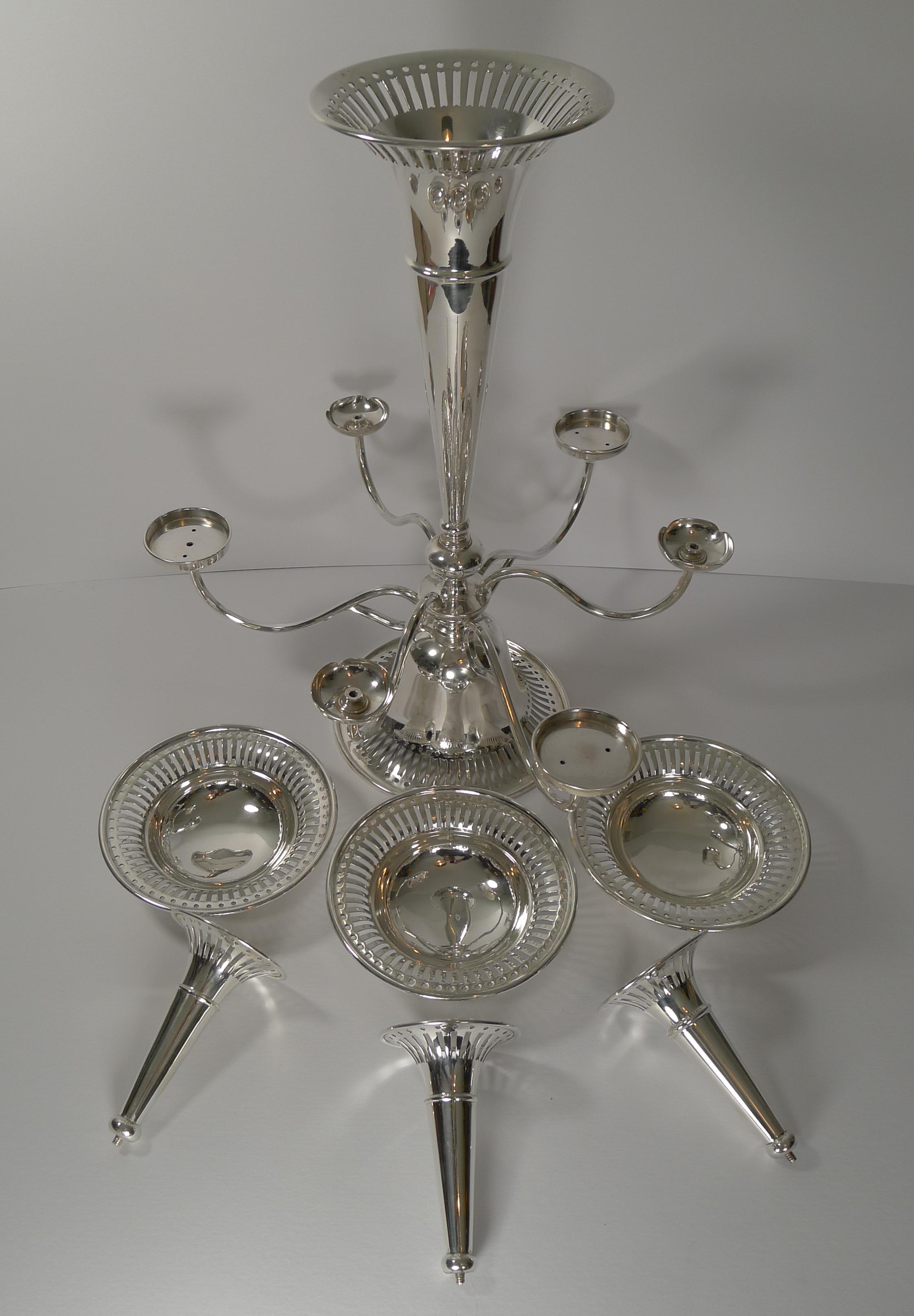 A handsome centrepiece / epergne dating to the early 20th century, circa 1910.

A grand and impressive piece which once filled and dressed would look outstanding in the dining room.

Excellent condition measuring approximately 17
