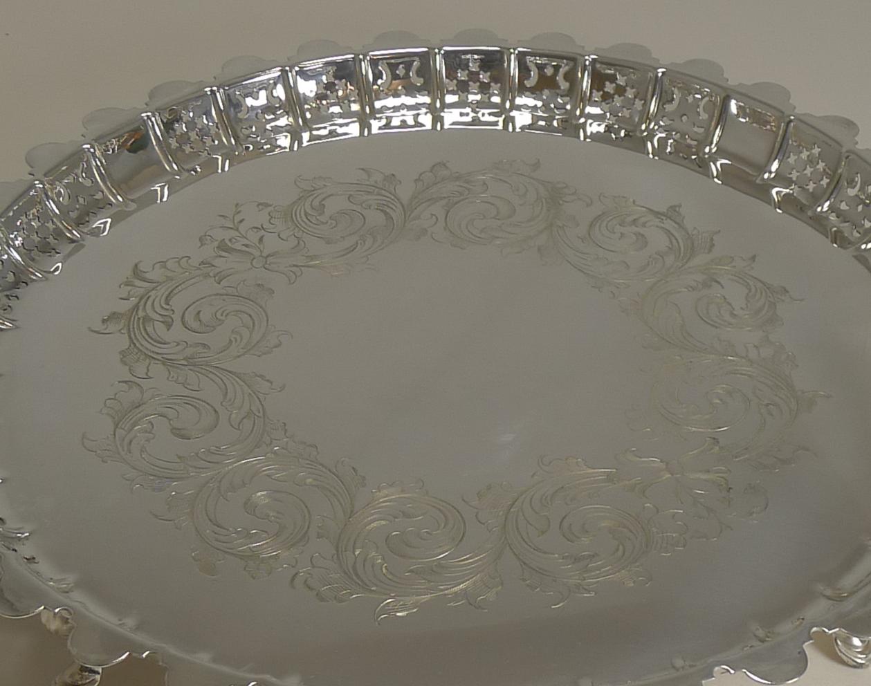 A fine early Victorian circular tray or salver made from silver plate with full marks on the underside for Henry Wilkinson and Co. together with their crossed keys mark.

It is also lucky enough to have an English design registration diamond