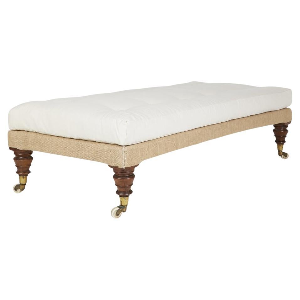 Large antique English squab cushion ottoman stool