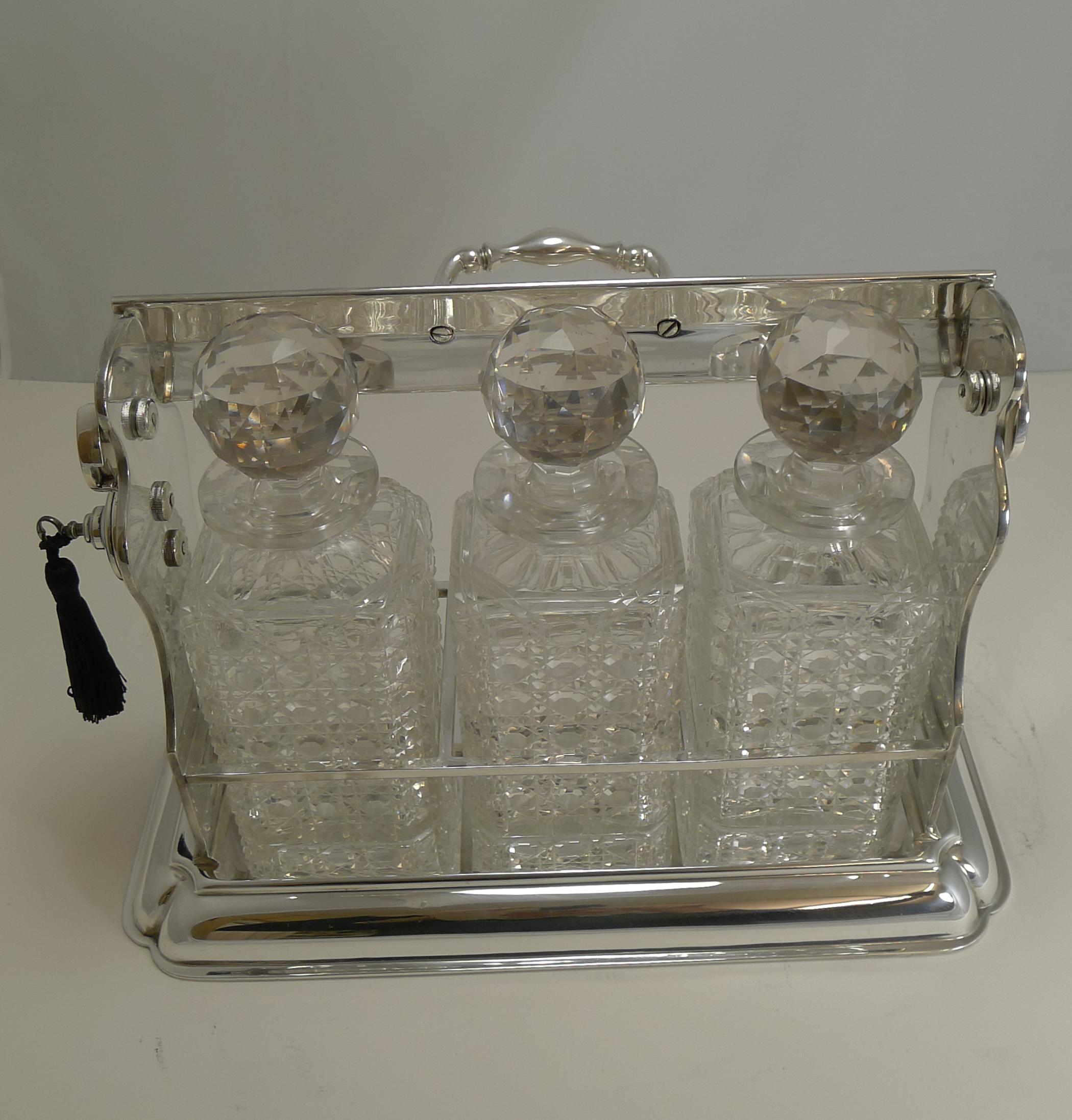 A handsome large example of a silver plated Tantalus made by the top-notch London silversmith, Mappin and Webb and dating to circa 1900.

The case comes with a working Bramah key, this is sprung and requires a slight push in and then turn. The