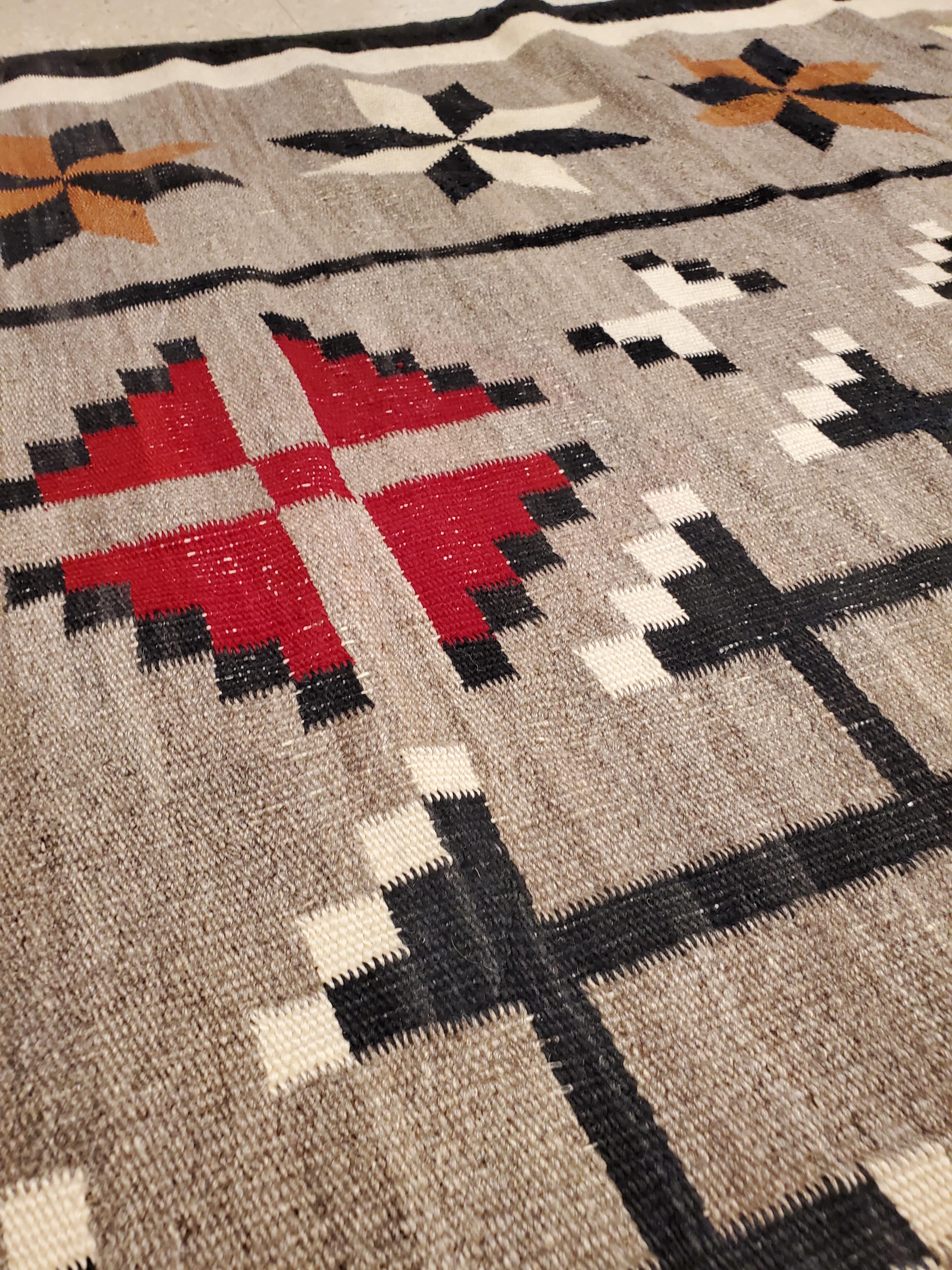 Large Antique Eye Dazzler Navajo Carpet, Handmade, Wool, Beige, Tan, Gray & Red For Sale 7