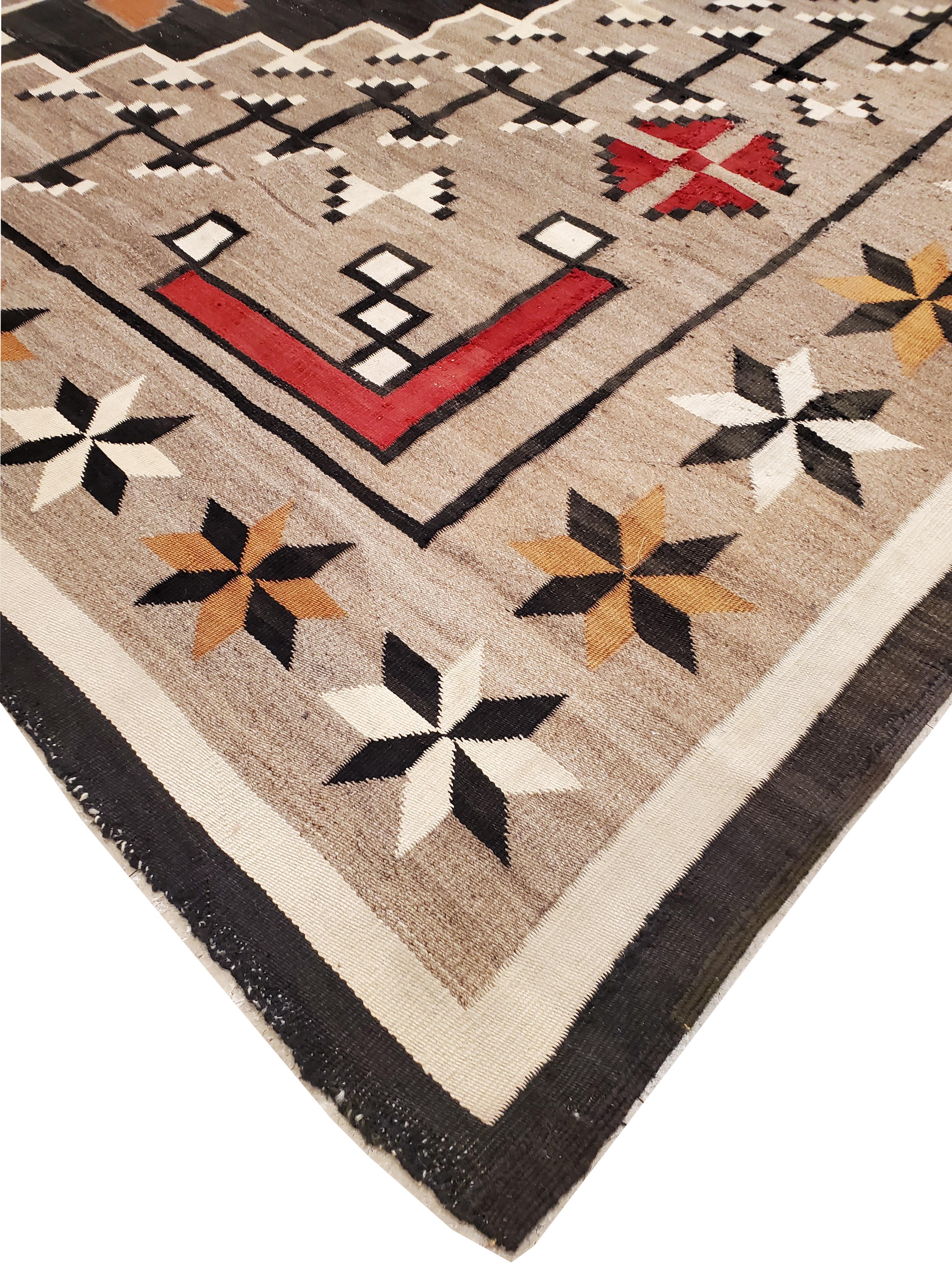 Large Antique Eye Dazzler Navajo Carpet, Handmade, Wool, Beige, Tan, Gray & Red In Good Condition For Sale In Port Washington, NY