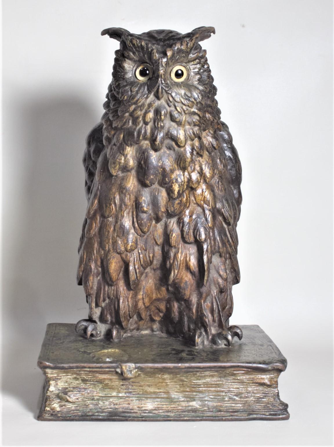 This large and substantial cast and cold-painted bronze sculpture of an owl standing on a book was made in Austria in circa 1880 in the period Victorian style. This sculpture is very well executed from all sides, showing considerable details to the