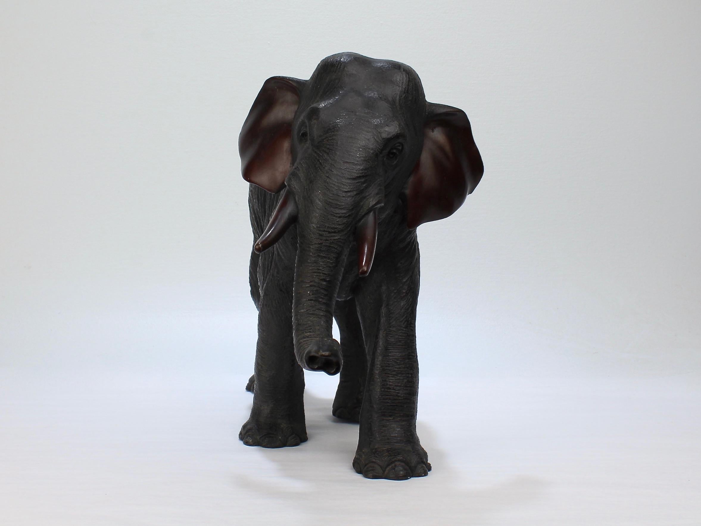 A wonderfully large-sized, antique Japanese Meiji period bronze elephant.

Cast with fine details and finished with a rich patina.

Unmarked for the maker.

Simply a great piece of Japanese sculpture in a rare, large size!

Length: ca. 18
