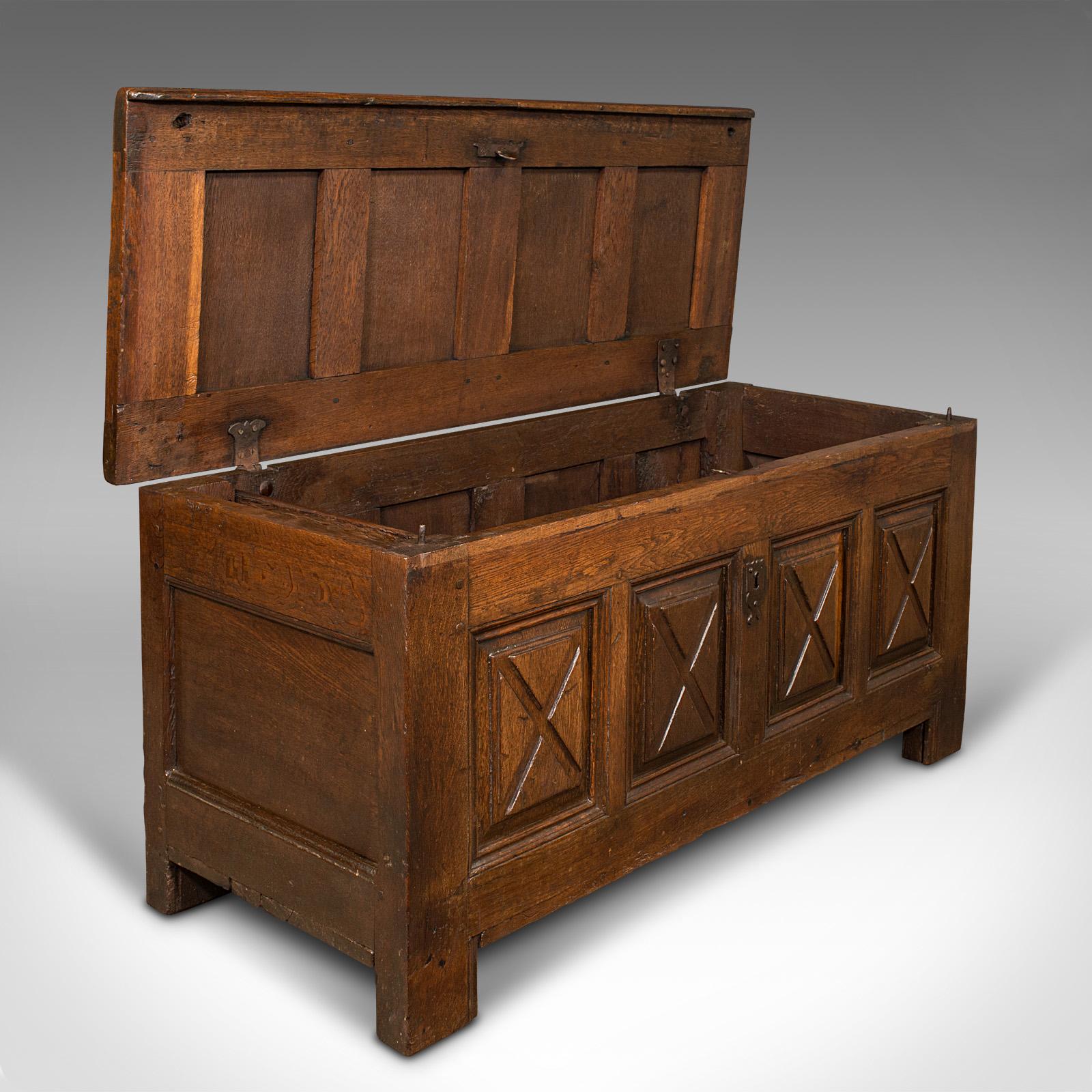 This is a large antique four panel coffer. A Scottish, oak chest or window seat, dating to the Georgian period, circa 1750.

Superb Scottish example from the George II period.
Displays a desirable aged patina and in good order