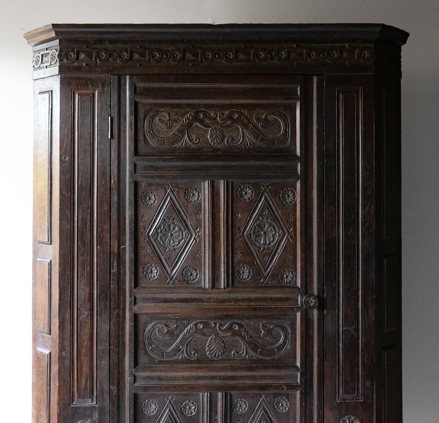 English  Large Antique Freestanding Carved Oak Corner Cabinet Cupboard, 17th Century For Sale