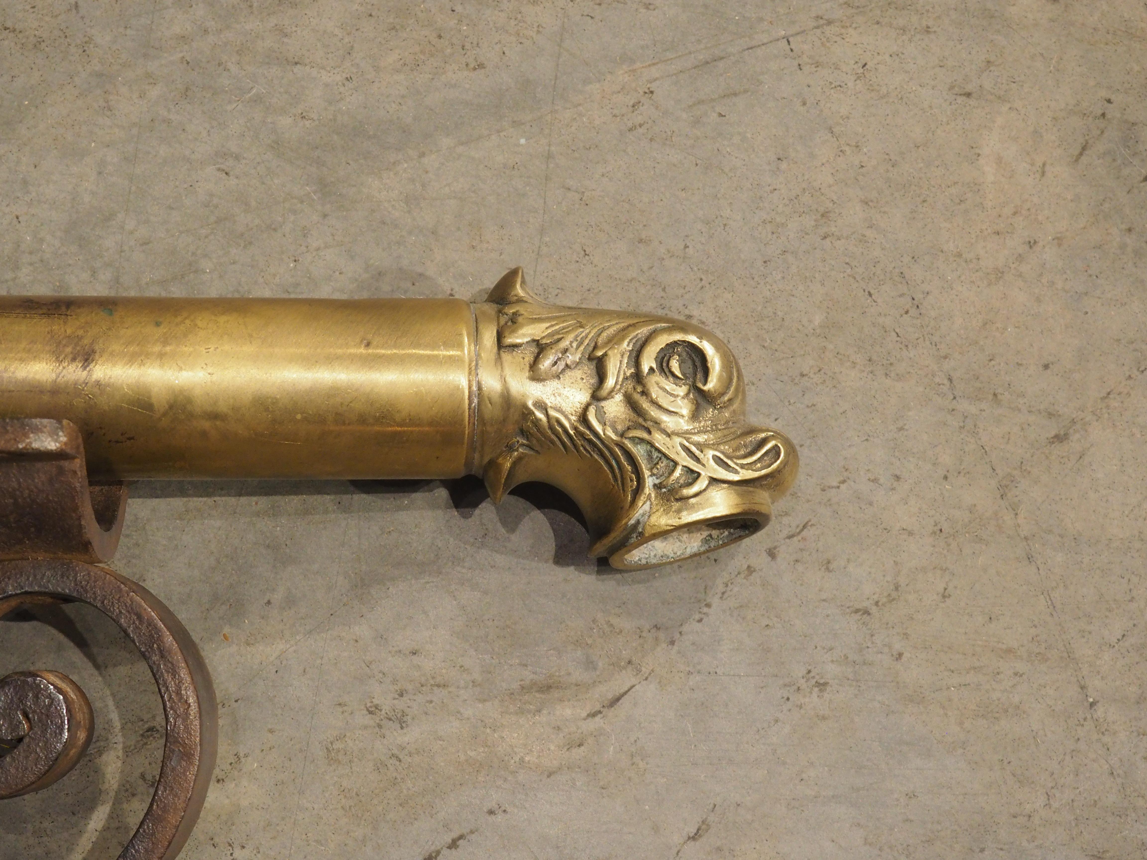 When France was ruled by kings, the heir to the throne was known as the Dauphin, therefore we see the dolphin motif used throughout many periods of French history and decorative arts. This brass fountain spout was crafted circa 1880 in eastern