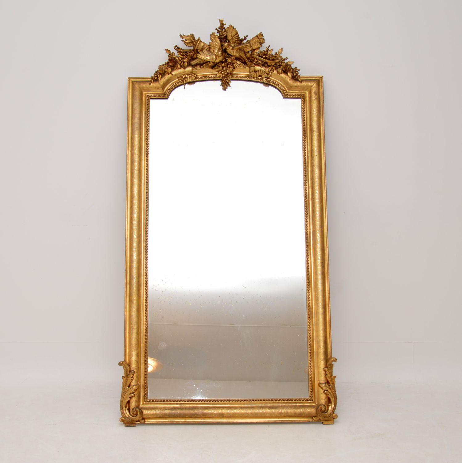 Large antique French carved giltwood mirror in excellent original condition & with some fine features. Please enlarge all the images to see all the fine details. The mirror itself is original & has a little spotting in places, but that’s acceptable