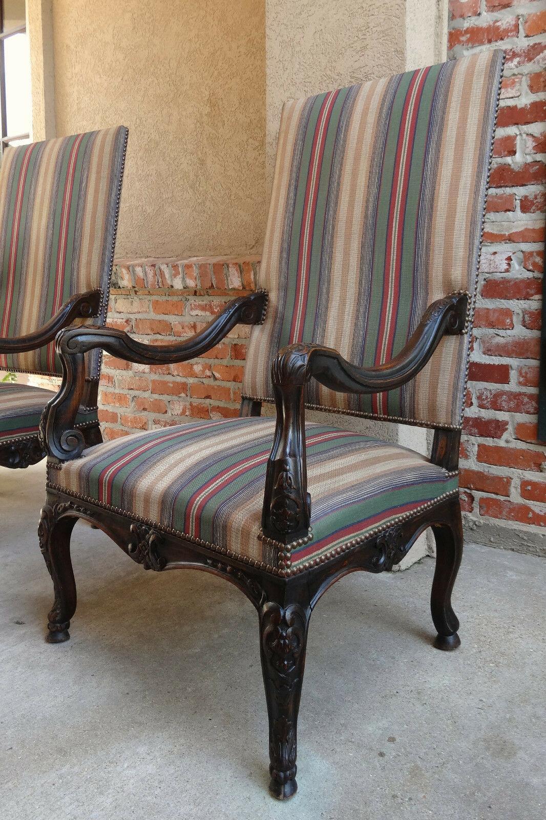 ~ Direct from France
~ Absolutely stunning antique French armchair
~ Tall & majestic
~ Hand-sculpted from fine French walnut in the manner of Louis XV, this elegant chair features beautiful jewel tone striped textile upholstery
~ Serpentine
