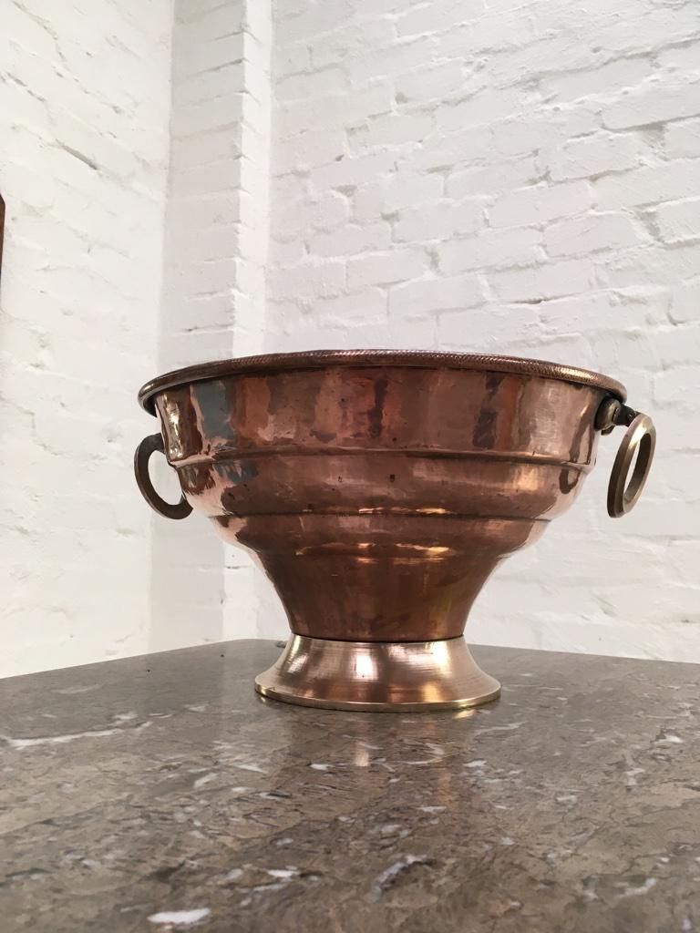 Beautiful 19th century handmade / hammered copper cooler with brass ring handles. 

Perfect for cooling of three to four bottles of wine, champagne, water etc. Can be also used as a Jardinière.