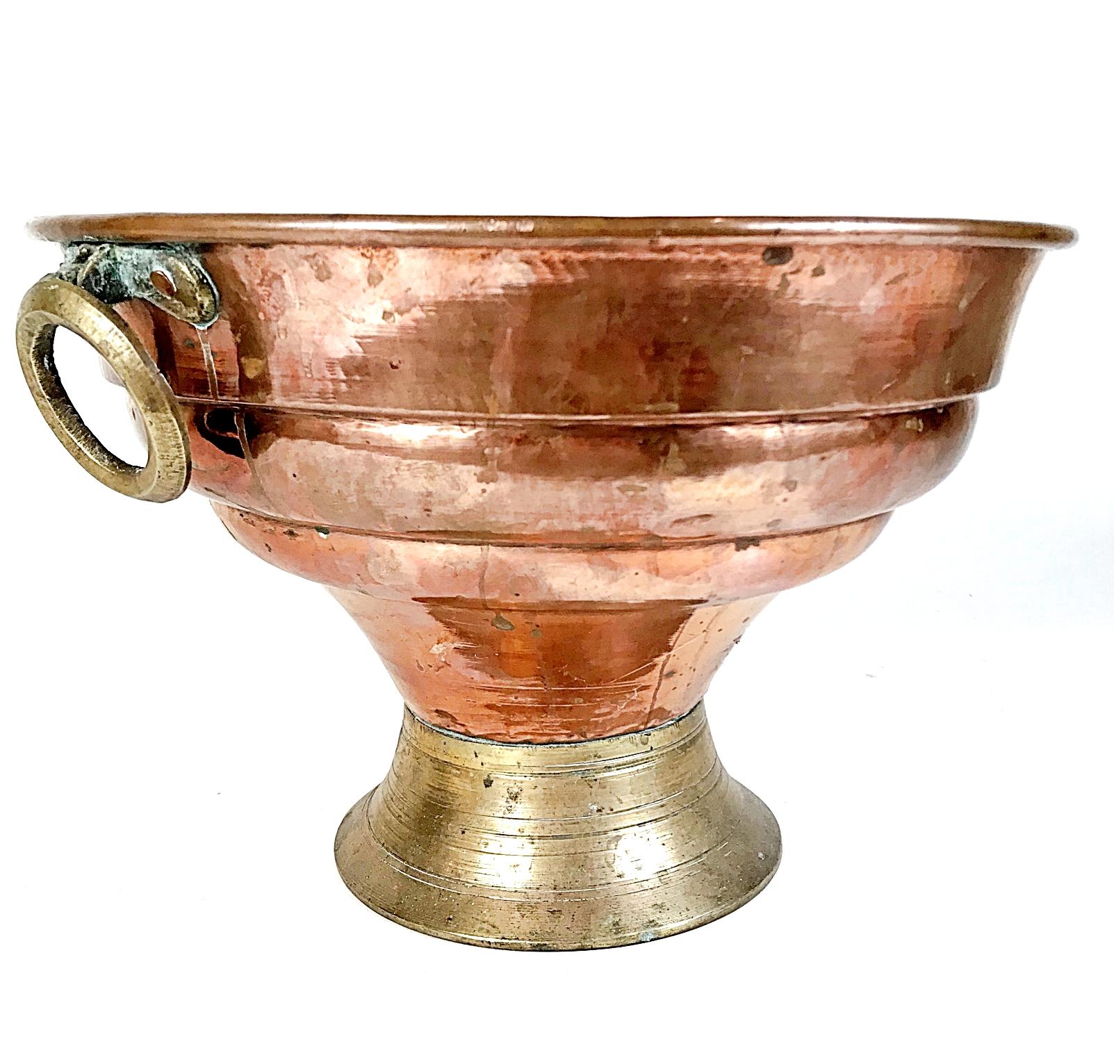 Beautiful 19th century handmade / hammered copper cooler with brass ringlet handles. Perfect for cooling of four bottles of wine, champagne, water etc. Can be also used as a Jardinière.