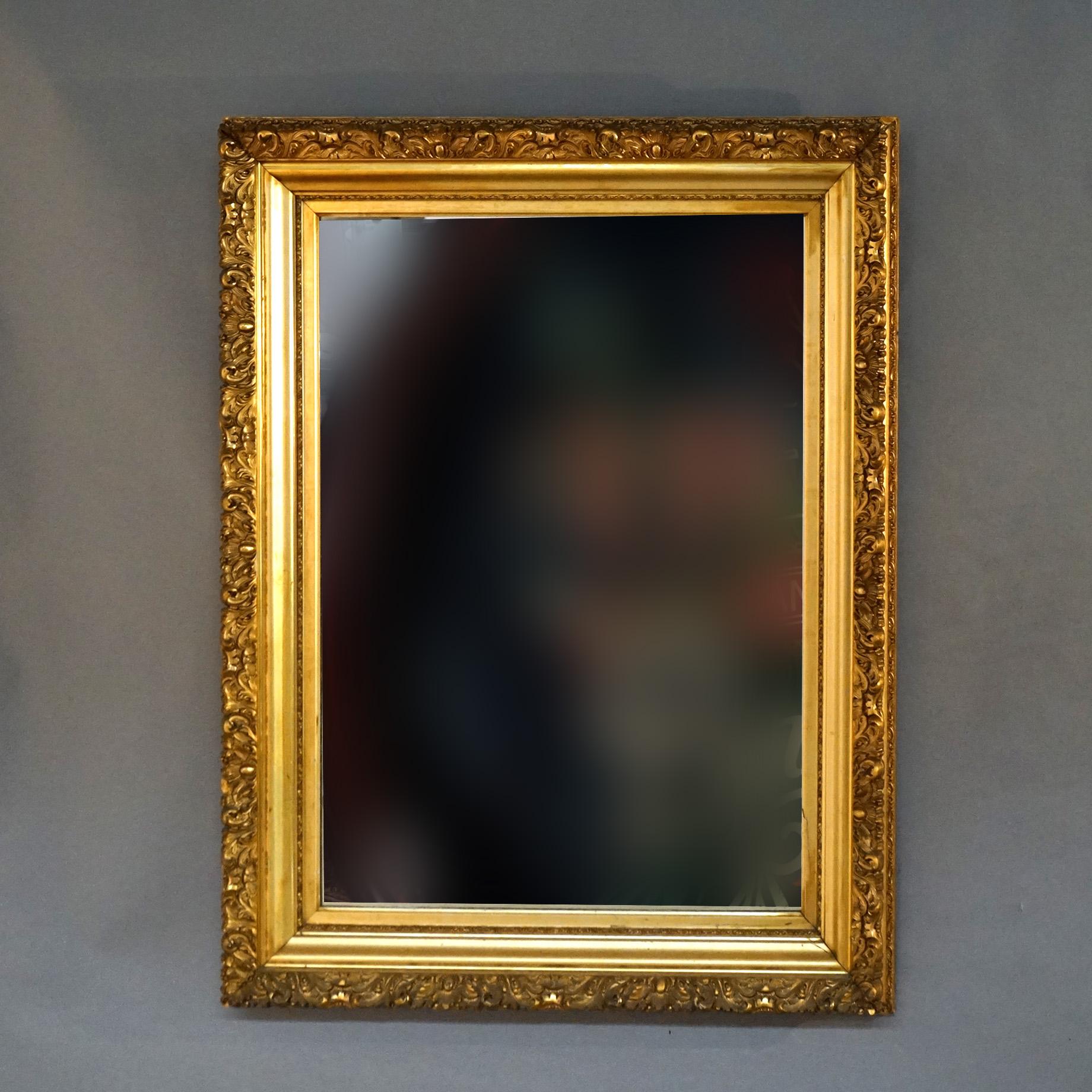 20ième siècle Grand miroir mural ancien de première finition française en forme de feuillage avec cadre en bois doré C1900 en vente