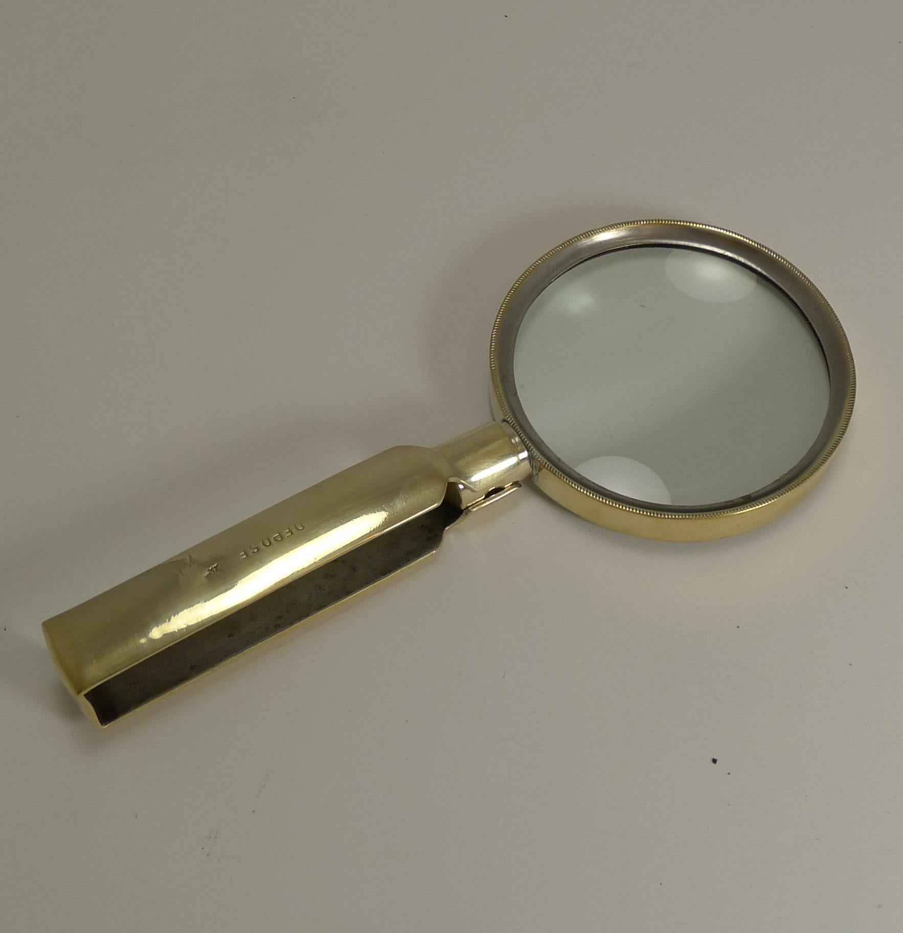 antique folding magnifying glass