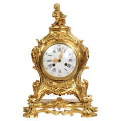 Gran reloj rococó francés antiguo de bronce dorado de Samuel Marti