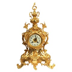 Grande horloge rococo française d'antiquités en bronze doré