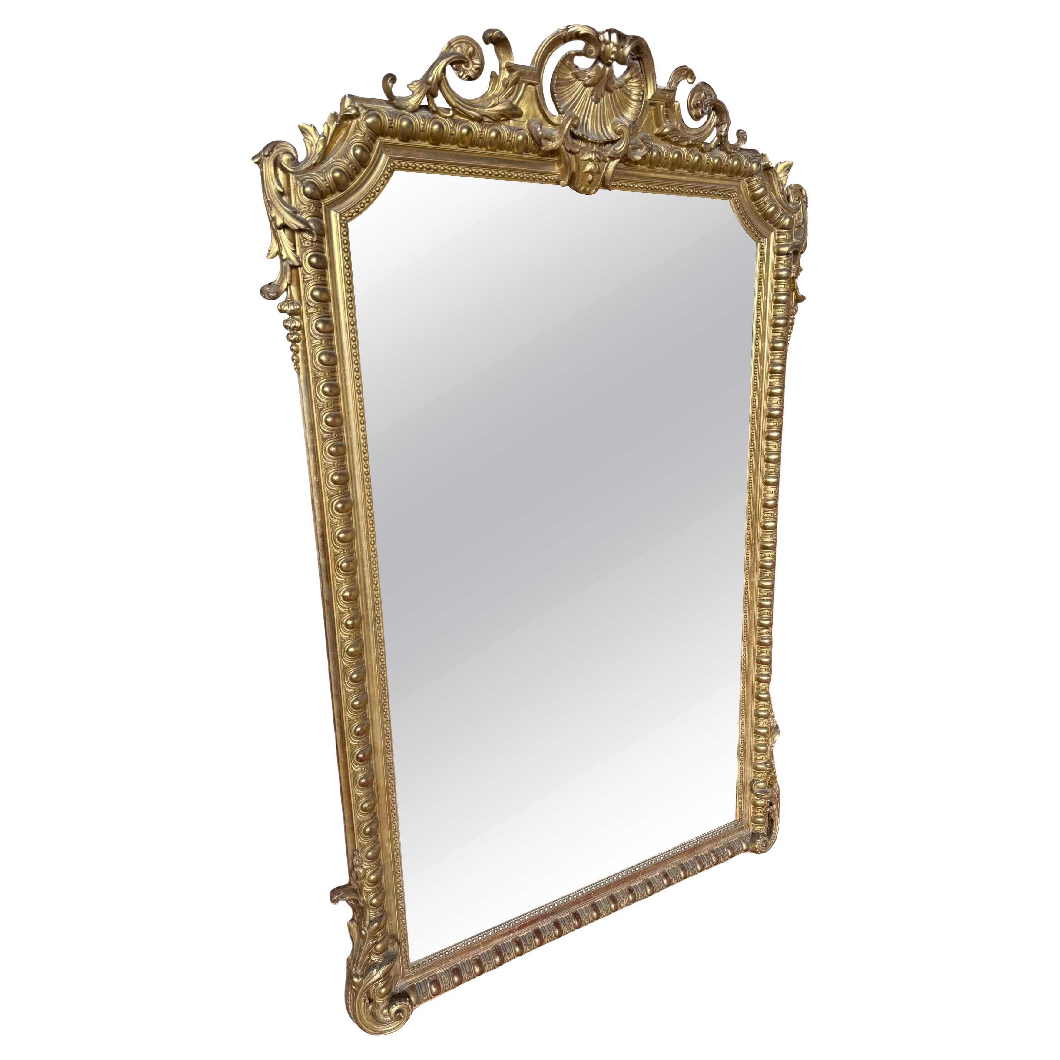 Large antique French gilt overmantle mirror
