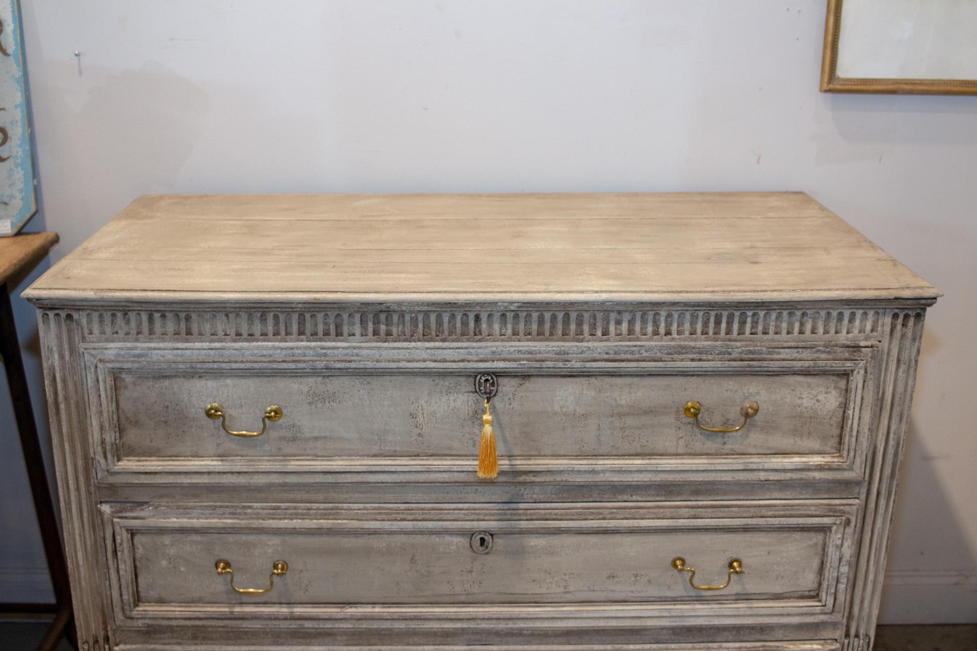 Discovered during our recent travels in France, this large chest of drawers features three solidly constructed drawers with dovetail joints for storage with a lovely 