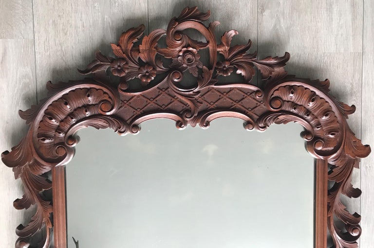 Hand-Carved Large French Mirror in Hand Carved Solid Nutwood Frame with Flowery Decor For Sale