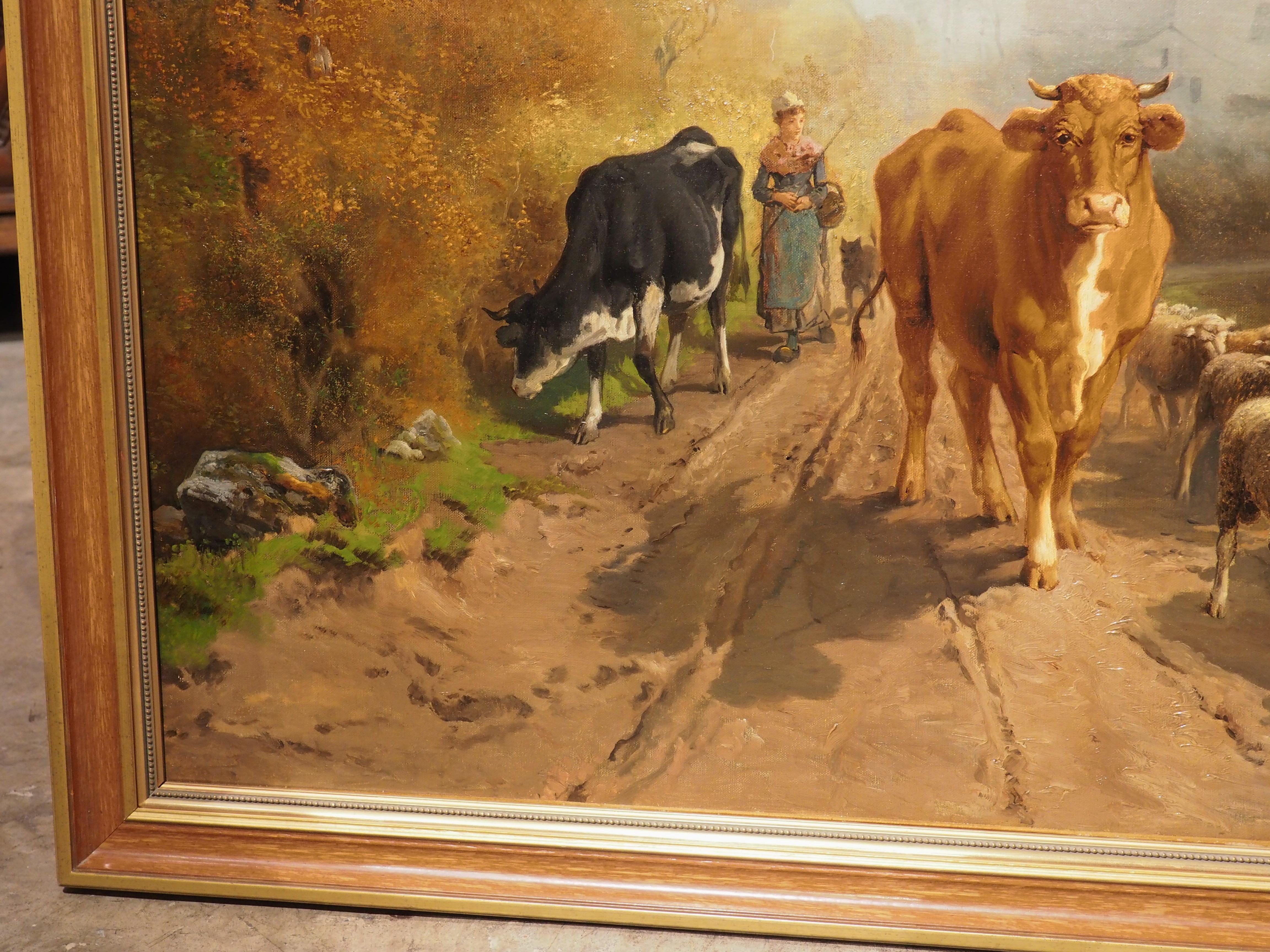 This large pastoral oil painting (nearly 51 inches long) portraying a woman walking among animals, has been signed and dated in the lower right by the artist, “Theo Levigne 1883”. The frame features gilded edges adorned with beading that flank brown
