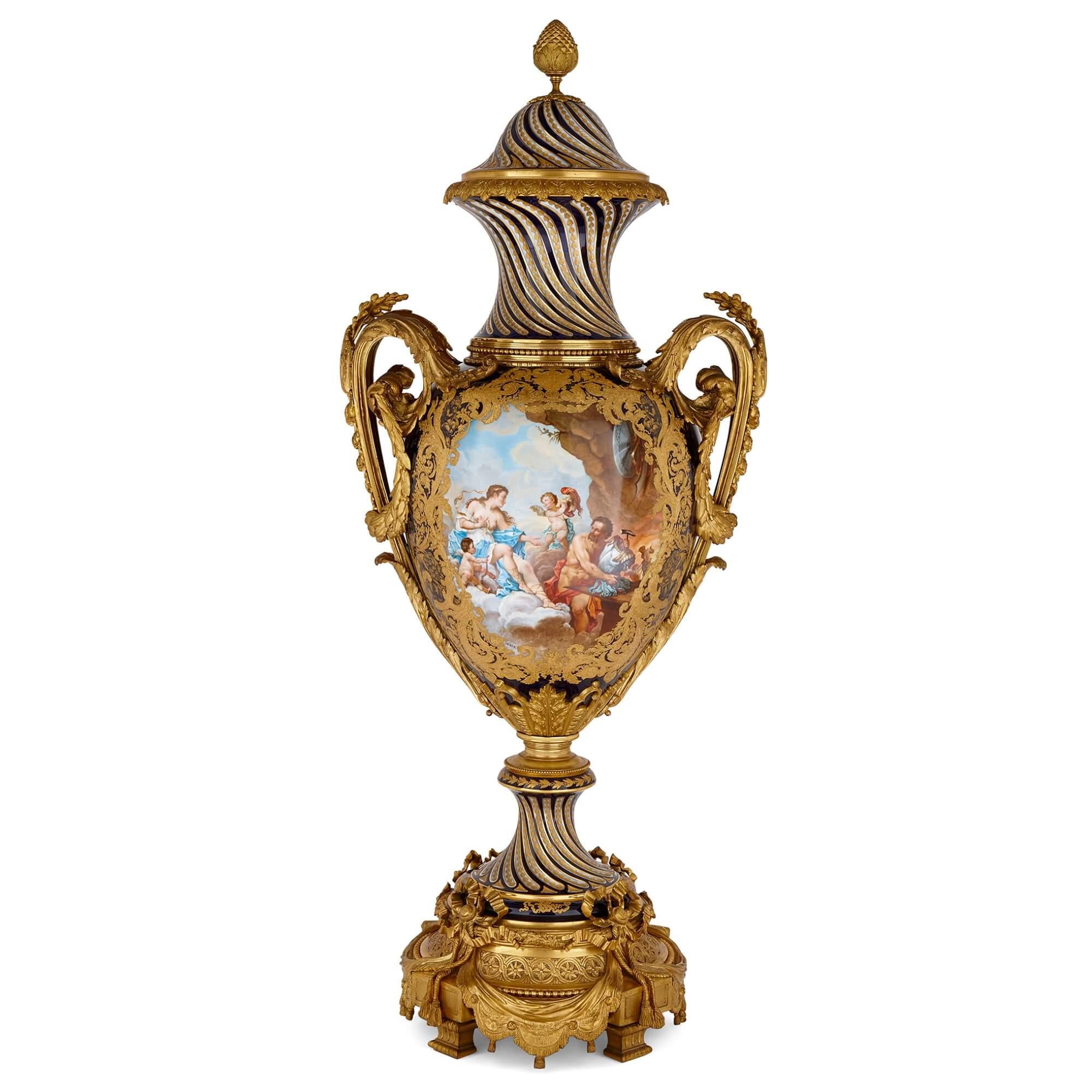 Large antique French Sèvres style porcelain and gilt bronze vase 
French, 19th Century 
Overall dimensions: Height 157cm, width 60cm, depth 44cm
Vase: Height 141cm, width 60cm, depth 44cm
Base: Height 16cm, width 41cm, depth 41cm

This outstanding