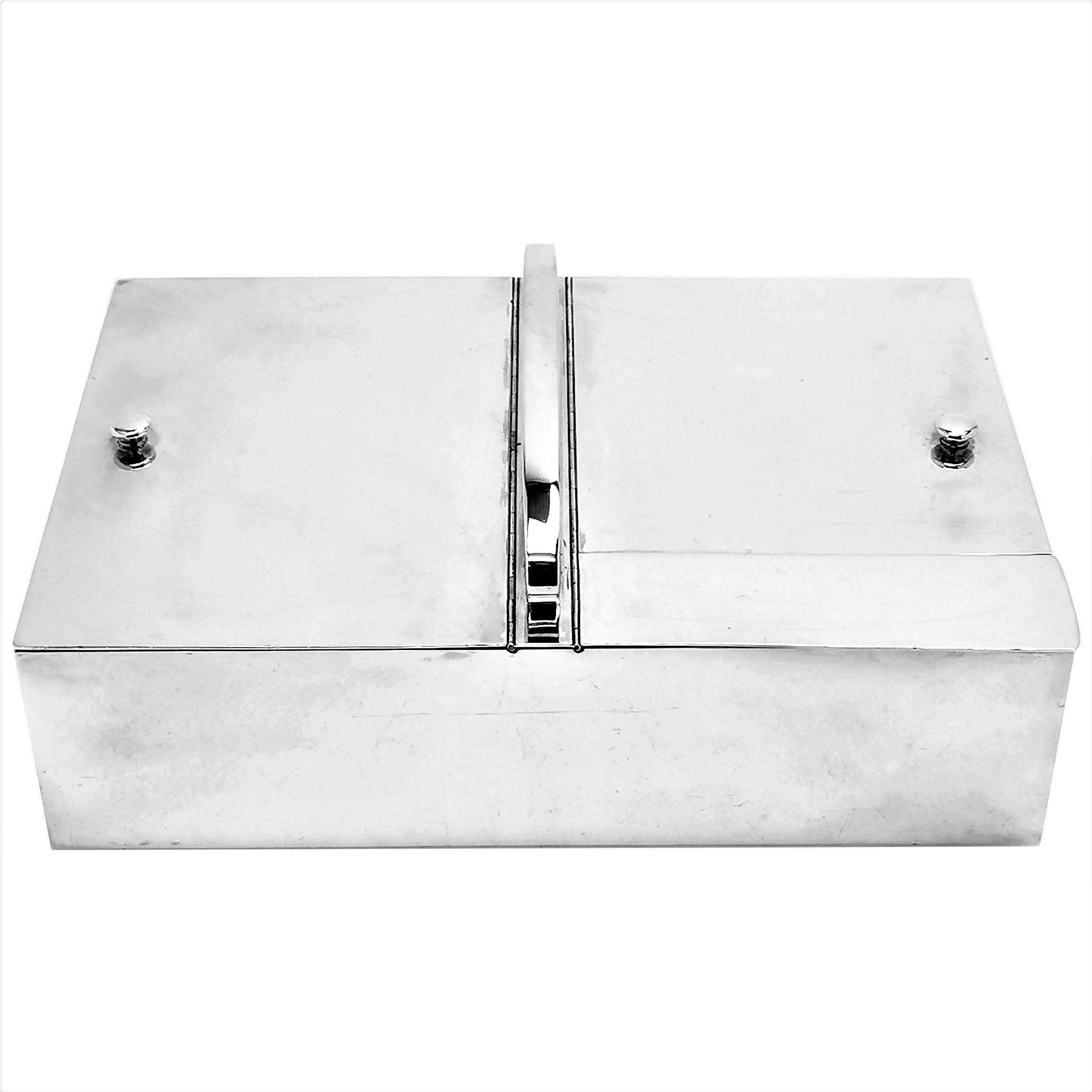 A magnificent French Antique silver Smokers Companion with two large compartments for cigars / cigarettes and one smaller compartment for matches and a match striker. The Smoking Box is of substantial size and weight and has a handle on the top for