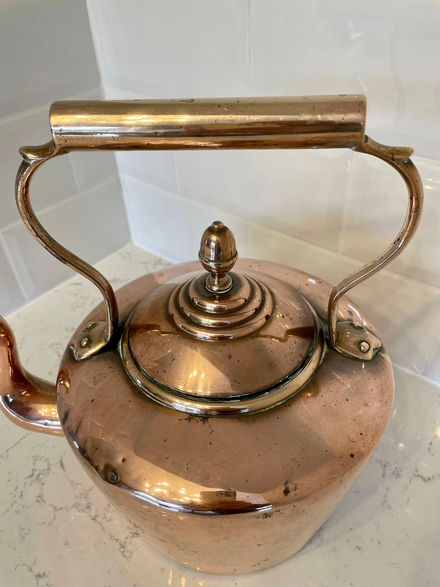 Large antique George III quality copper kettle having a quality shaped handle and spout, lift of lid with original finial.

As photographed we have a similar example available.

Measures: H 36cm
W 32cm
D 22cm 
Date 1800.
 