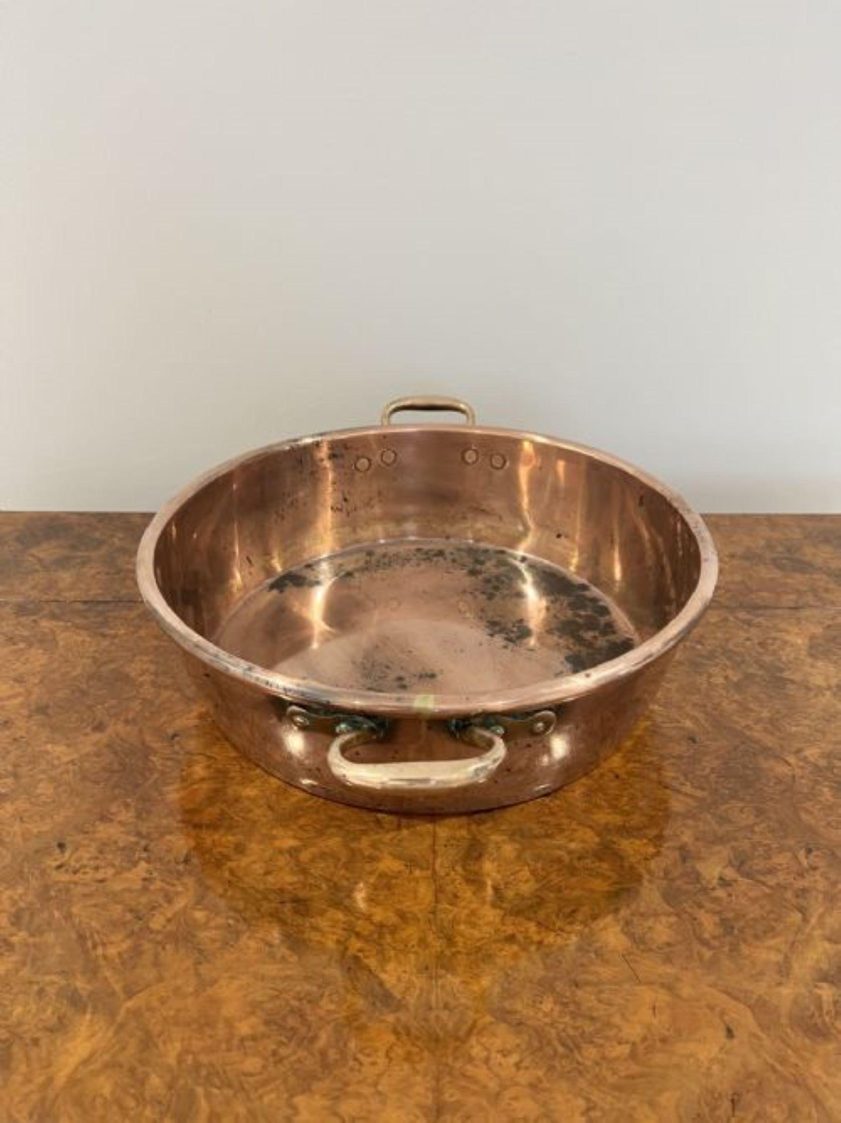 Large antique George III quality copper pan having a quality large George III copper pan with shaped handles to both sides. 