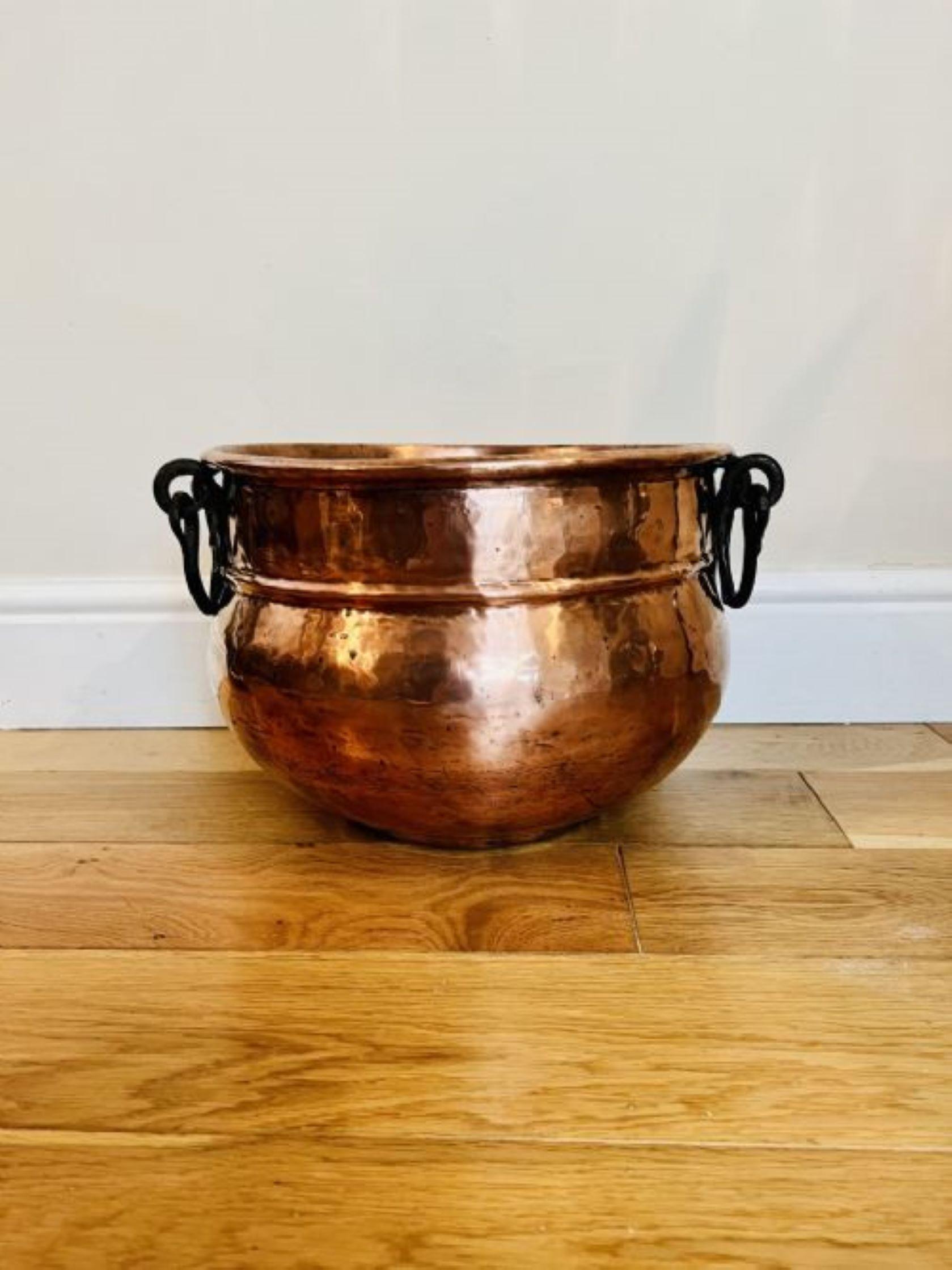 Large antique George III quality copper pot having the original iron swing handles to both sides with a quality shaped circular copper pot 