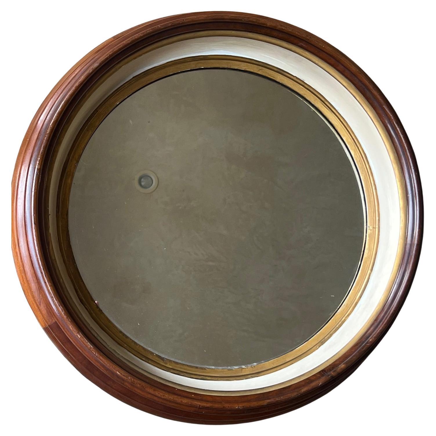 Espejo redondo embutido del siglo XIX / principios del XX.  El espejo georgiano tiene las caras interiores pintadas de color crema y dorado.

Recogida gratuita en el Área de la Bahía de San Francisco
