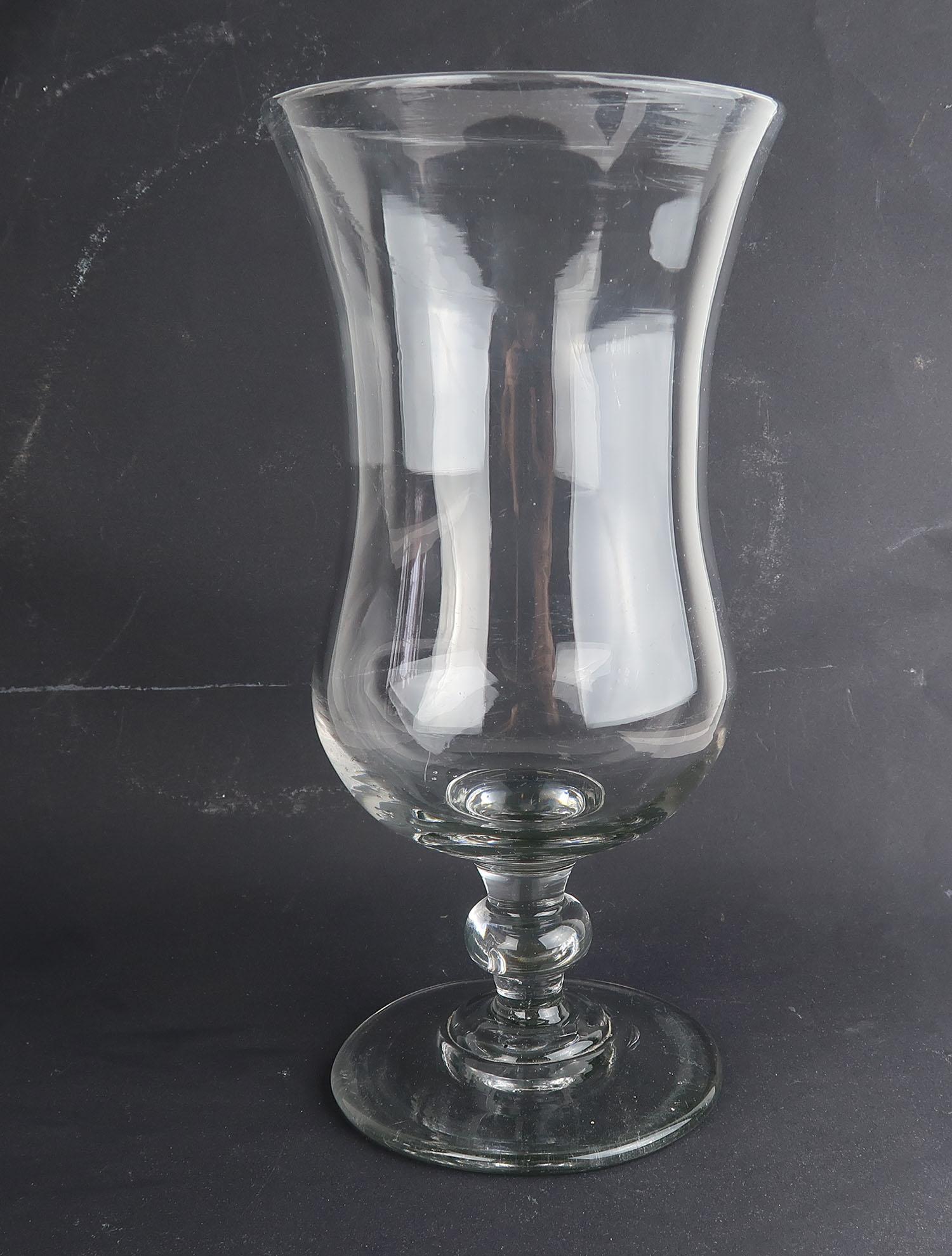 Beautiful shaped glass vase. 

For flowers or a candle

Lovely thick bubbly glass and great clarity

Handblown with polished out pontil mark on base.
 