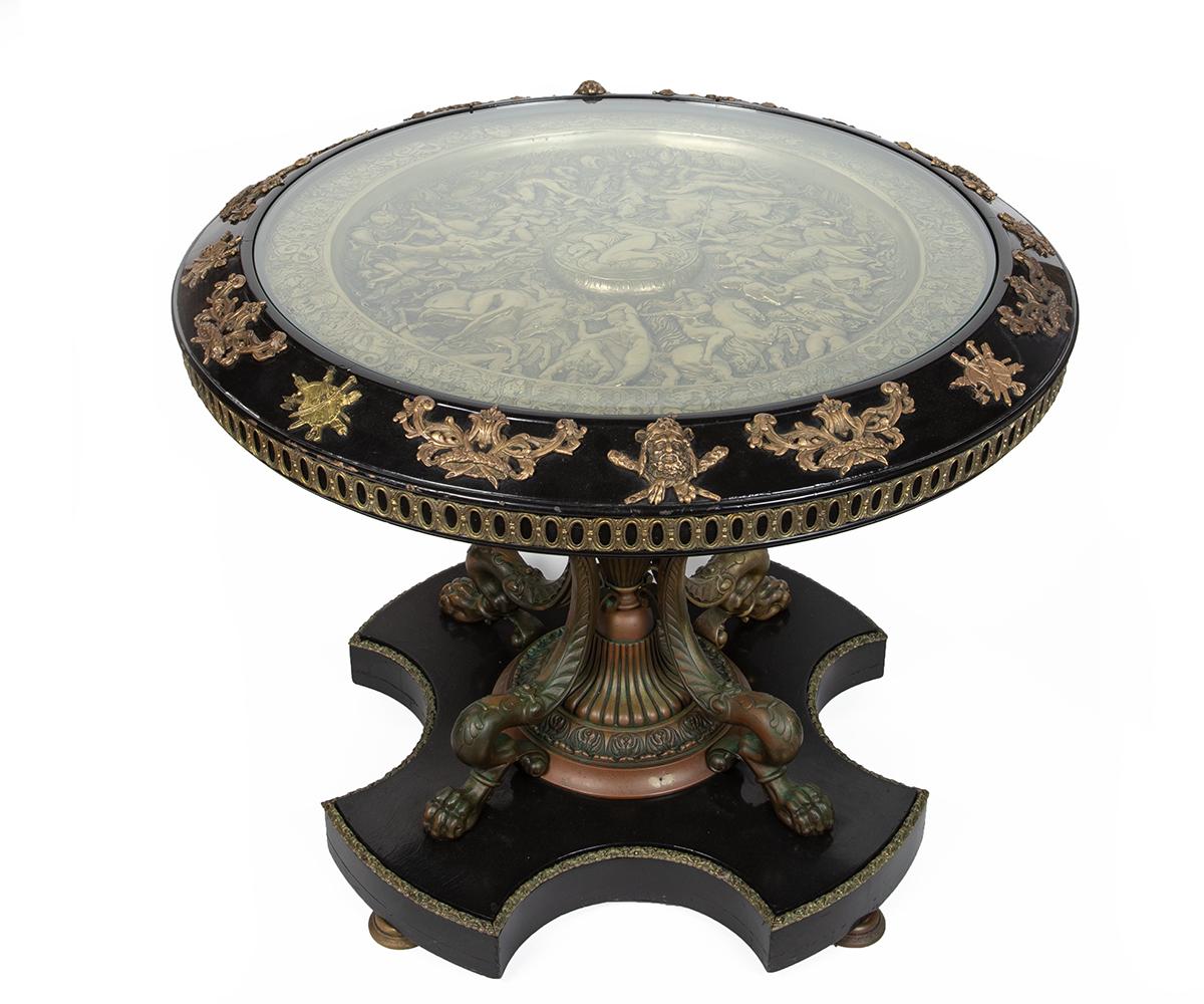 Large antique hand hammered Italian gold-plated on copper shield inset under glass side table with ebonized wood framed and bronze figurative inset around the table frame. This is truly one of kind piece of art!!!