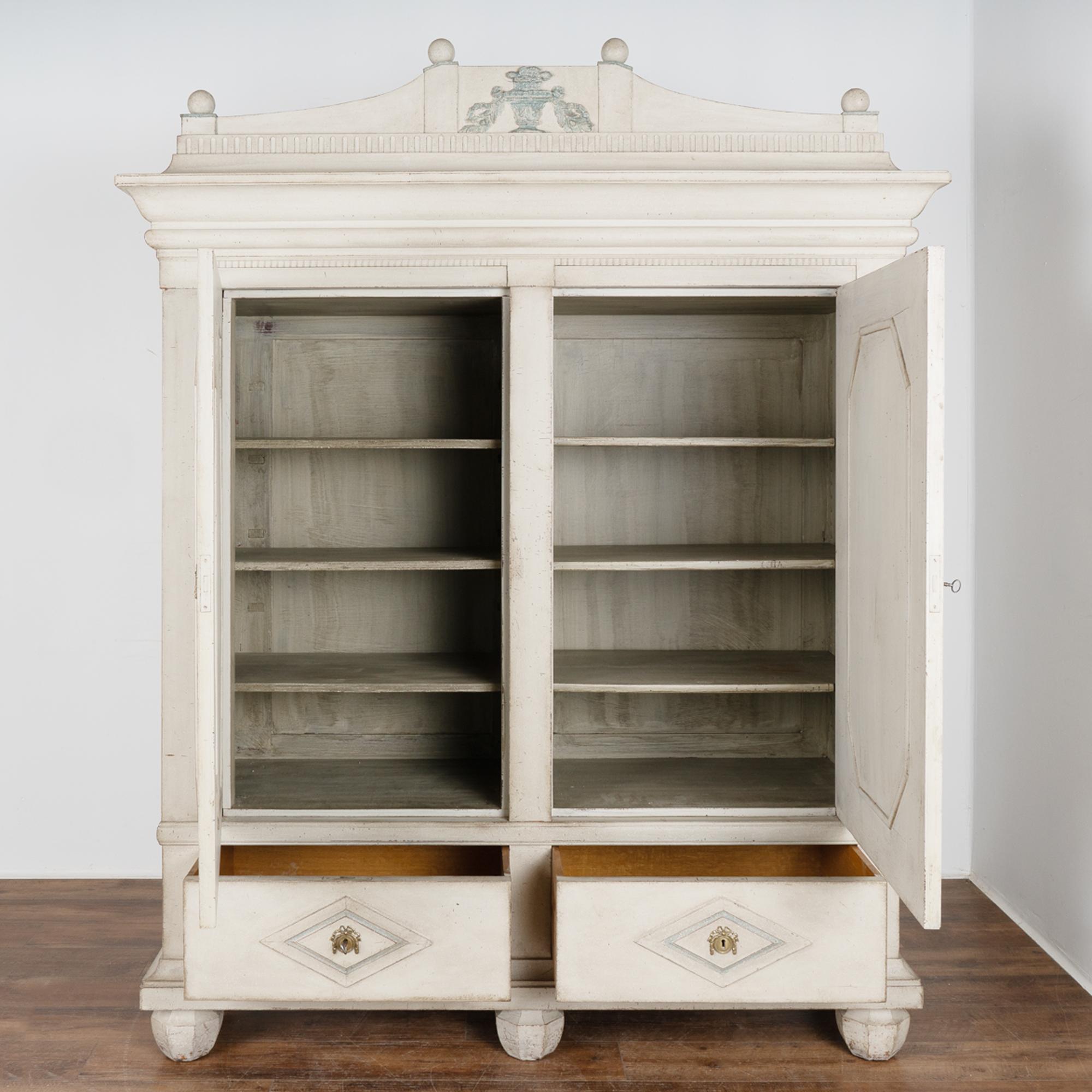 large armoire with drawers