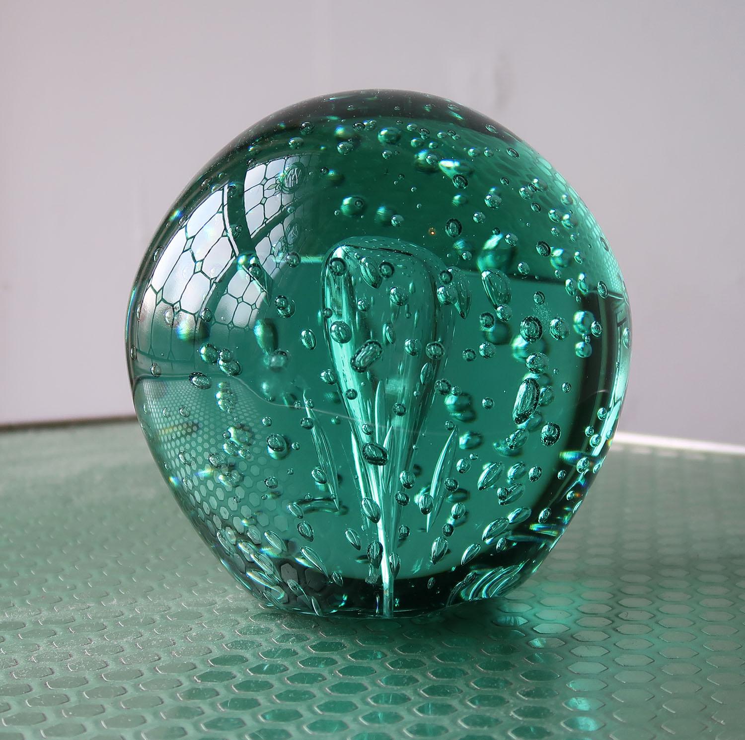 Wonderful piece of green glass with an amazing bubbly interior.

Most likely originally a doorstop or a paper weight

Good condition. 


