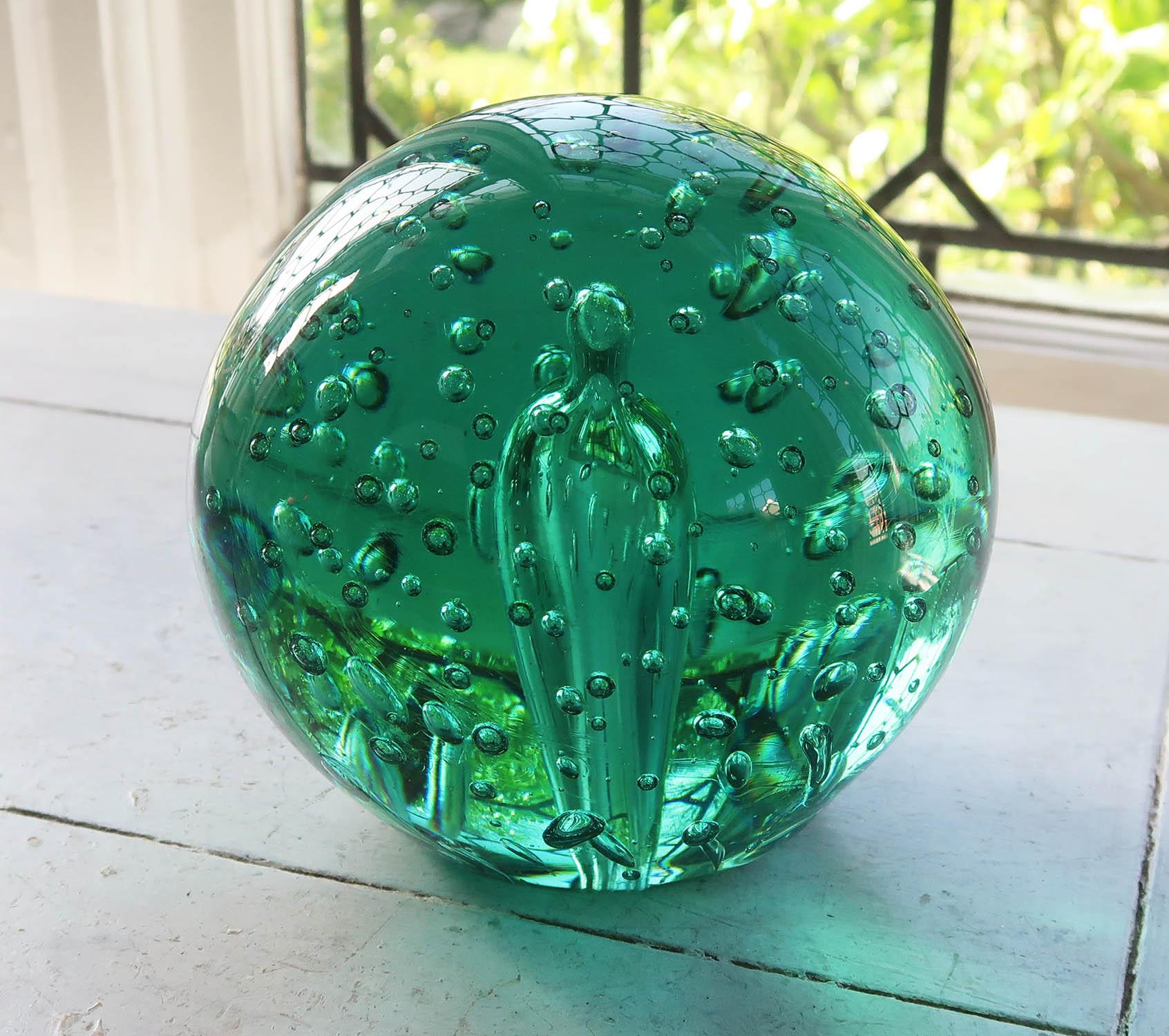 Wonderful piece of green glass with an amazing bubbly interior.

Most likely originally a doorstop or a paper weight

Good condition. 



