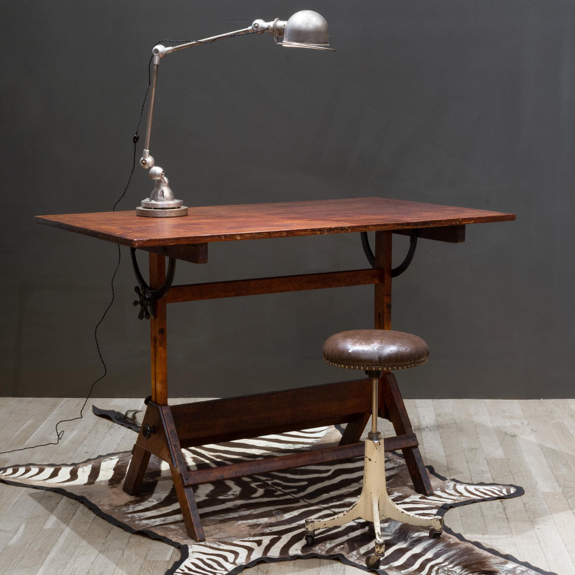 ABOUT

Contact us for more affordable shipping options: S16 Home San Francisco. 

A fully adjustable industrial drafting table with solid Maple top, wooden base and solid cast iron black knobs. Original brass Hamilton label.

The table can be used