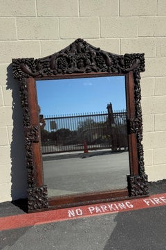 Large Antique Hand-Carved Oak Black Forest Style Figural Wall Mirror