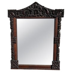 Large Antique Hand-Carved Oak Black Forest Style Figural Wall Mirror