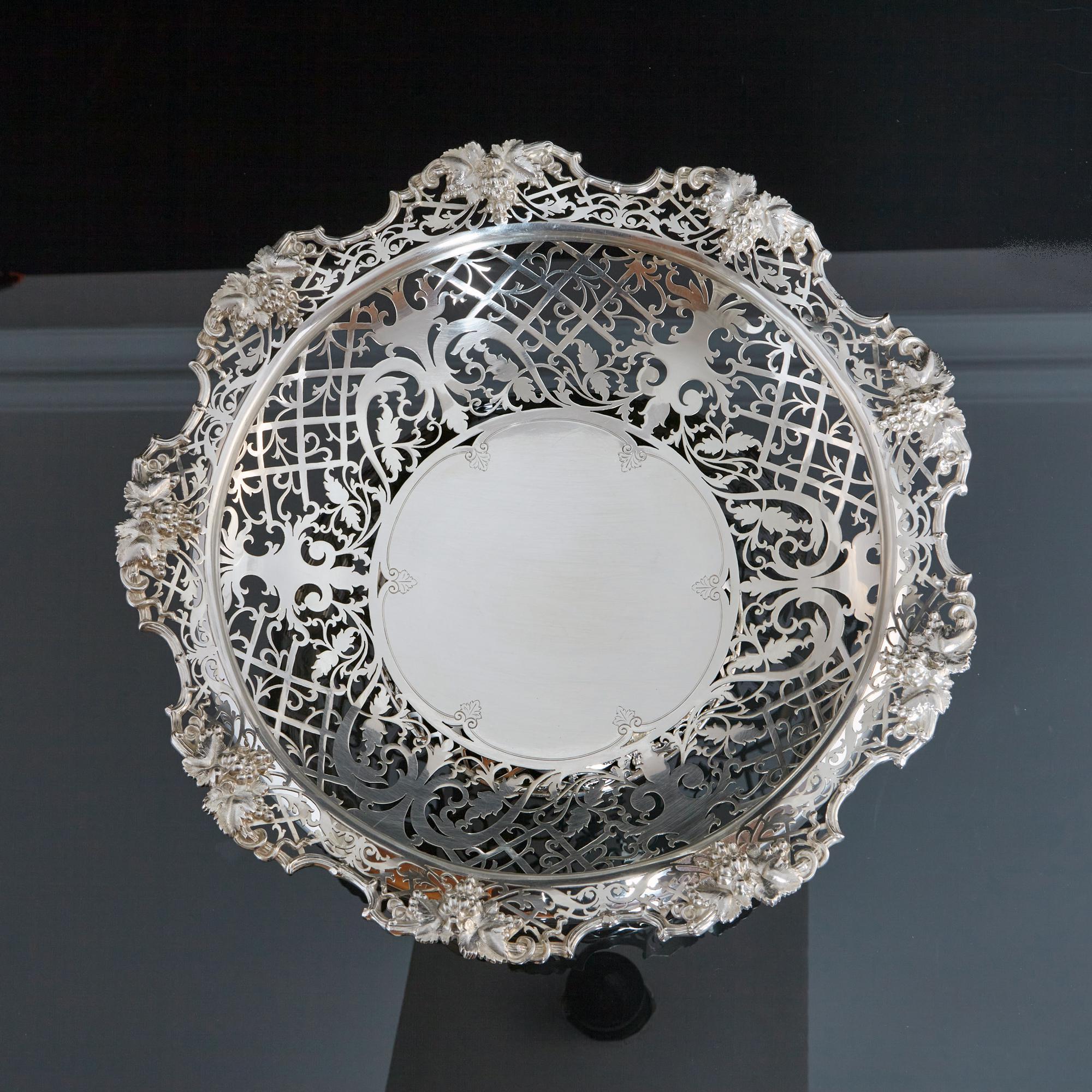 A most impressive antique, pierced silver fruit bowl entirely hand constructed and the largest example of this style we have seen. The bowl and base have been raised from single circles of silver, the patterns were then drawn on by the artist before