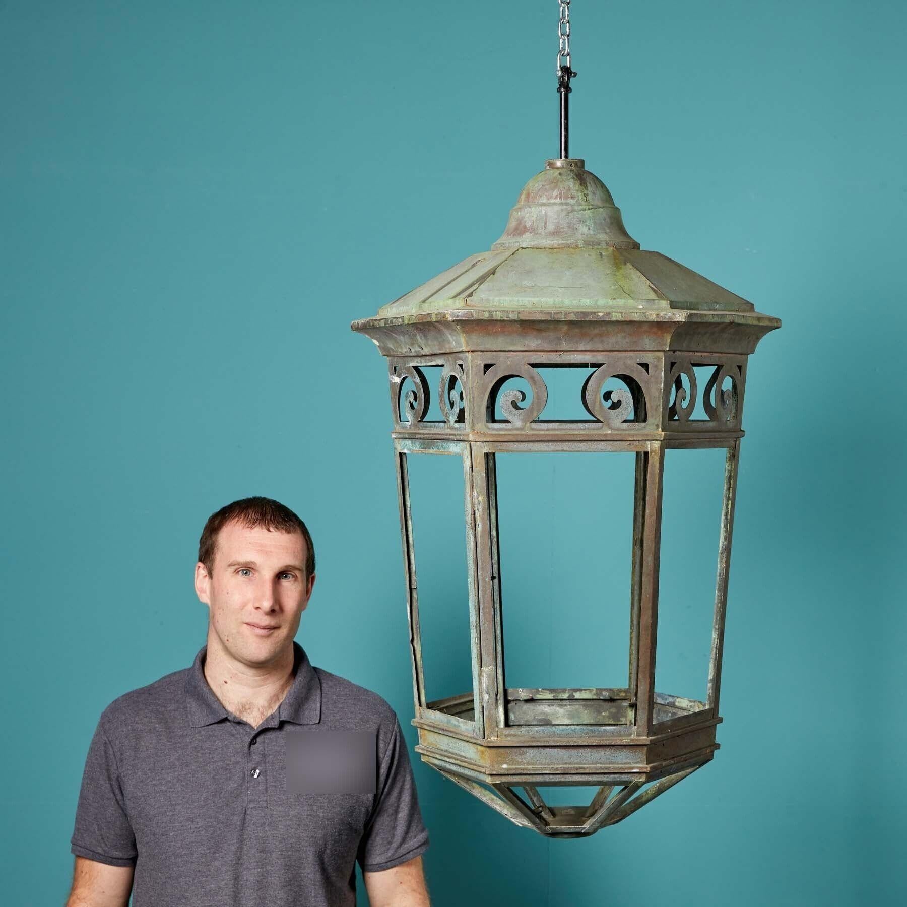 Large antique hanging Lantern. A wonderful, large and effective lantern with a weathered patina finish.