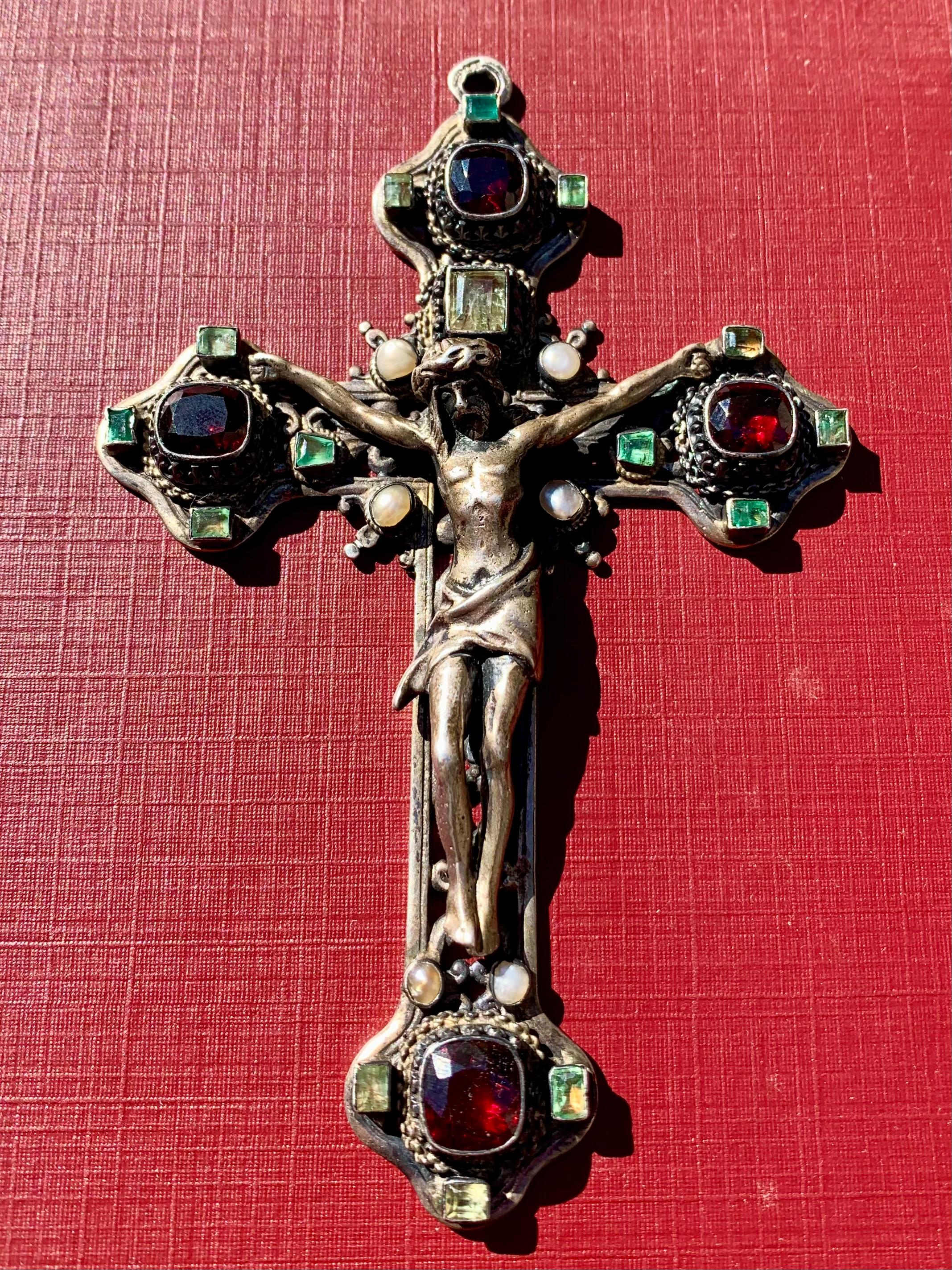 Exquisite museum quality large antique High Renaissance style emerald, natural pearl, garnet silver pectoral cross
19th century
Makers Mark: K.T. for Tauböck, Karl
Austro-Hungarian Empire silver hallmark 
Hungarian gold and silvermiths have been the